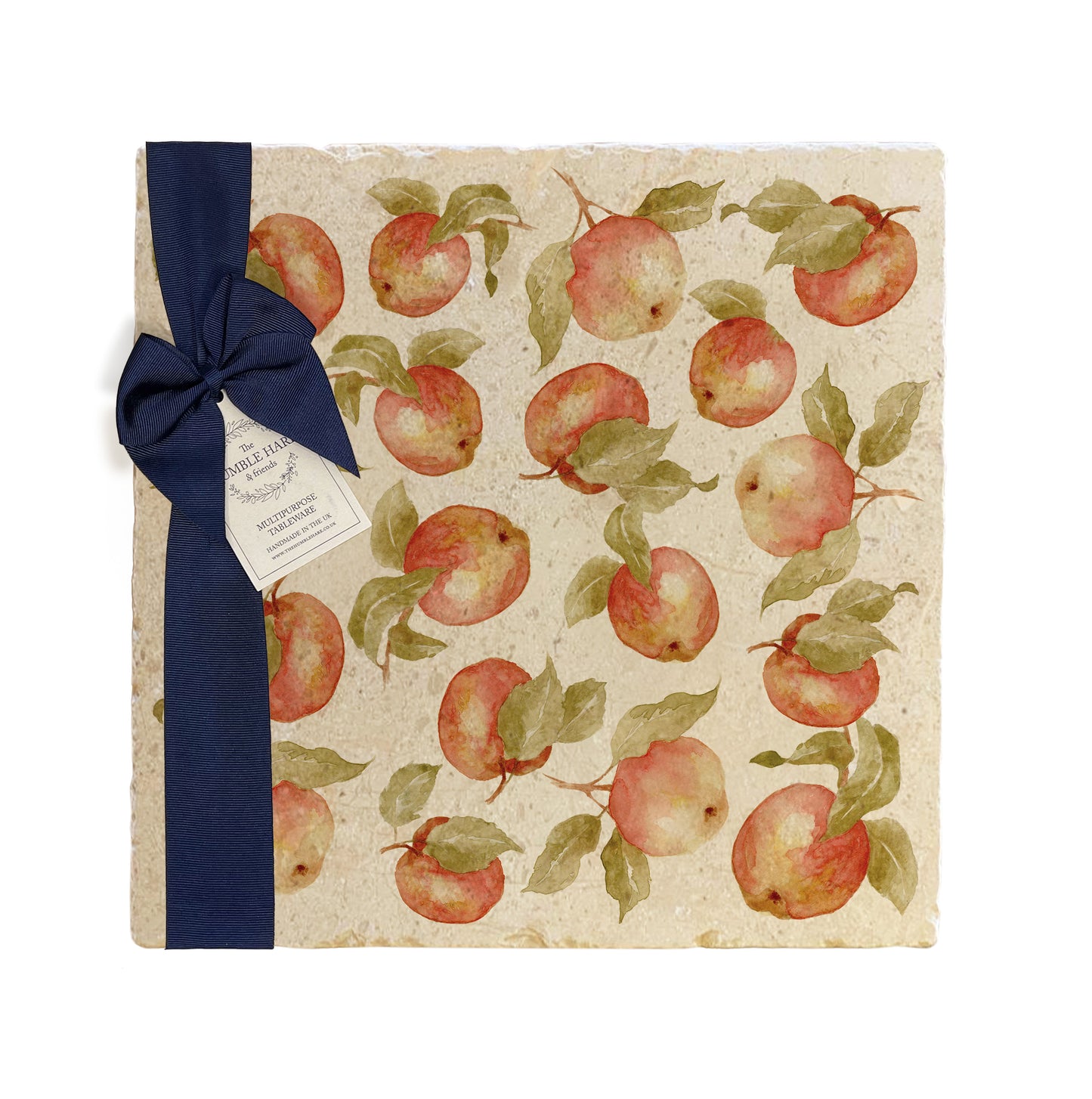 A large multipurpose marble platter with a watercolour apple pattern, packaged with a luxurious dark blue bow and branded gift tag.
