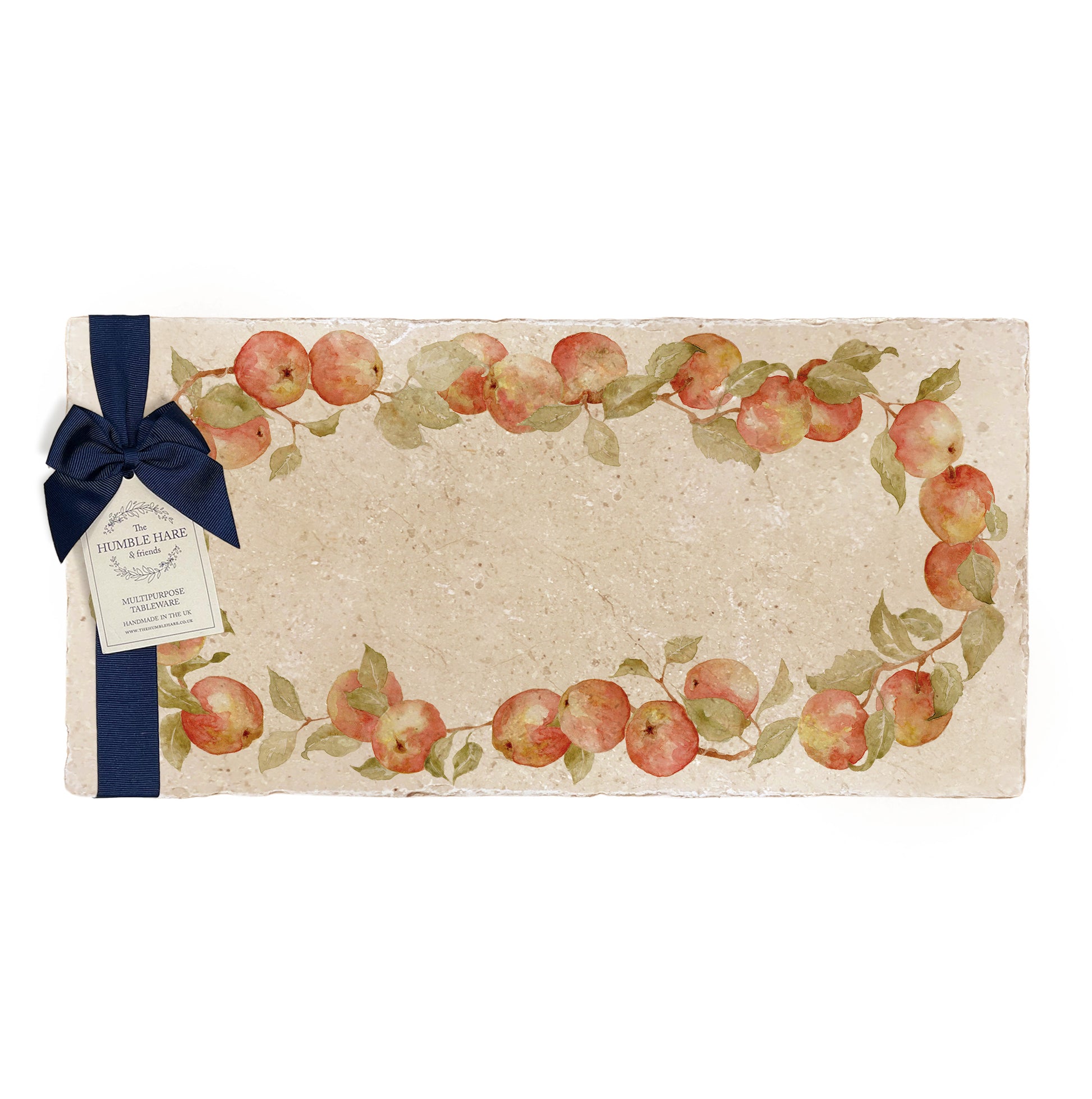 A multipurpose marble sharing platter with a watercolour apple wreath design, packaged with a luxurious dark blue bow and branded gift tag.