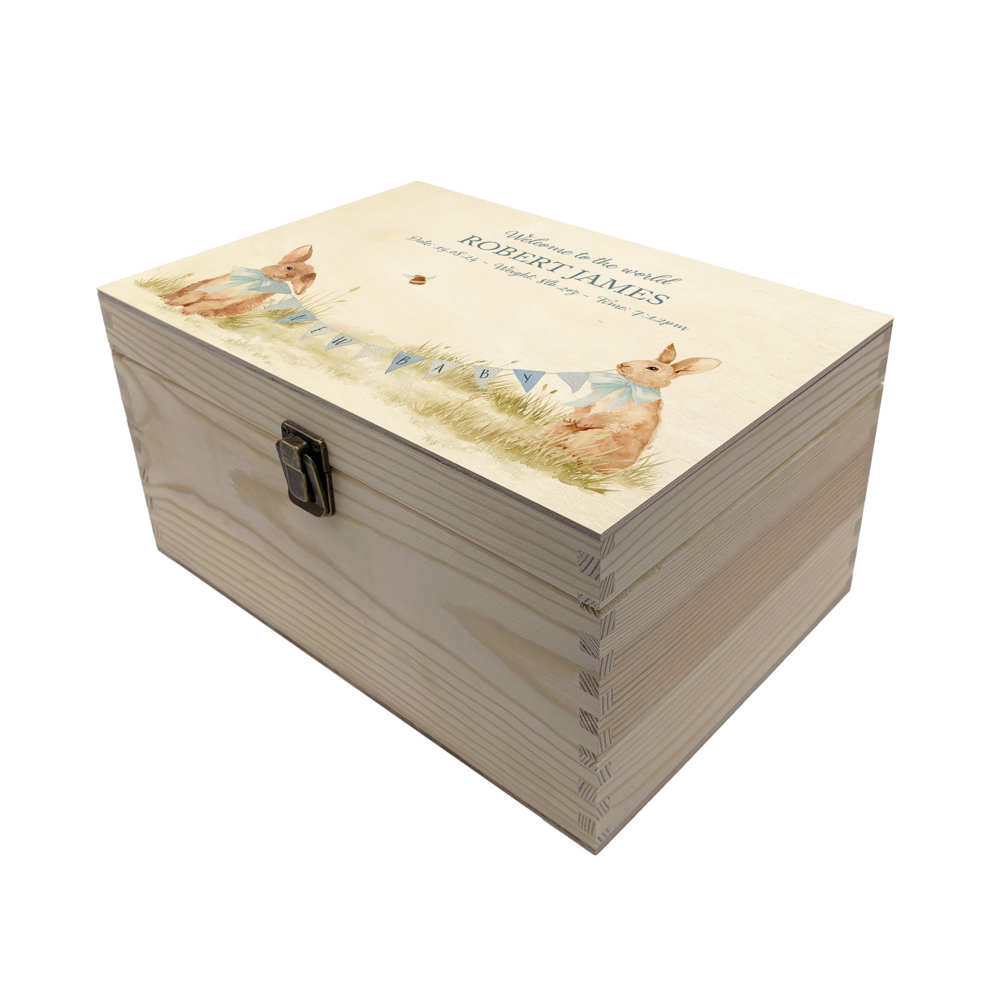 Medium sized wooden pine personalised keepsake box. The design theme is perfect for New babies, Welcome to the world, baby showers and christenings. This design has baby bunnies, playing in a meadow style grass and a buzzy Bee flying around. This design can be personalised by adding a beautiful bunting and a luxurious bow around their necks in blue or pink. Add the extra special touch to your special occasion.