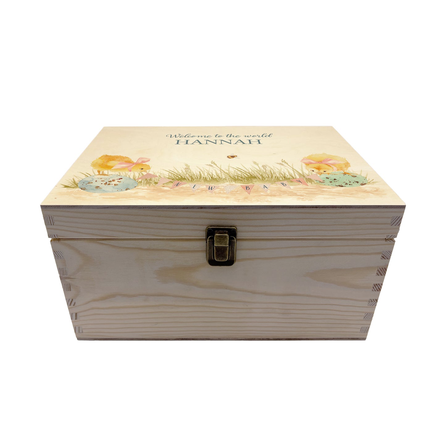 Medium sized wooden pine personalised keepsake box. The design theme is perfect for New babies, Welcome to the world, baby showers and christenings. This design has baby Chicks playing on some giant speckled eggs nestle in grass with a buzzy Bee flying around. This design can be personalised by adding a beautiful bunting and a luxurious bow around their necks in blue or pink. Add the extra special touch to your special occasion.