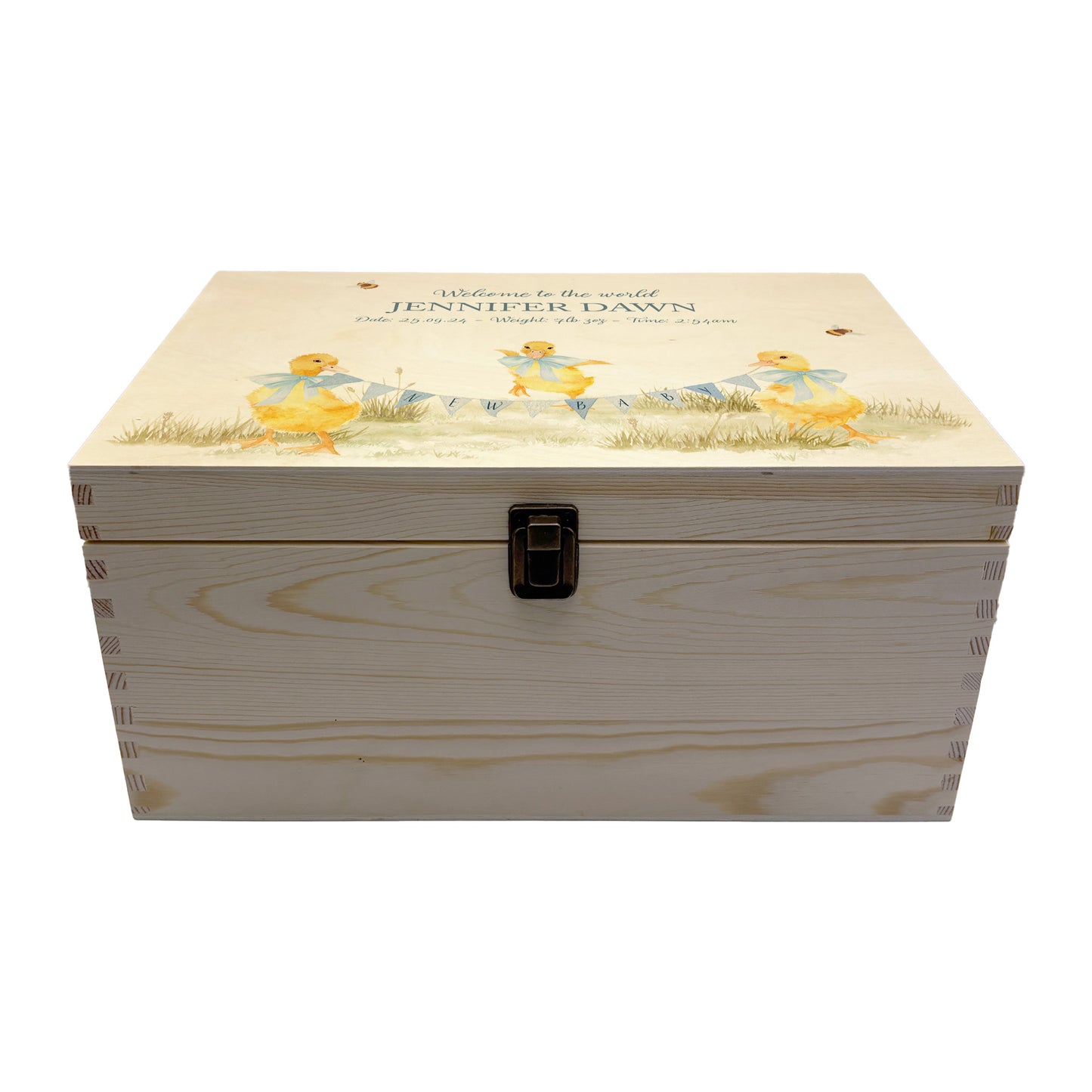 Large sized wooden pine personalised keepsake box. The design theme is perfect for New babies, Welcome to the world, baby showers and christenings. This design has baby ducklings in meadow style grass and a buzzy Bee flying around. This design can be personalised by adding a beautiful bunting and a luxurious bow around their necks in blue or pink. Add the extra special touch to your special occasion.