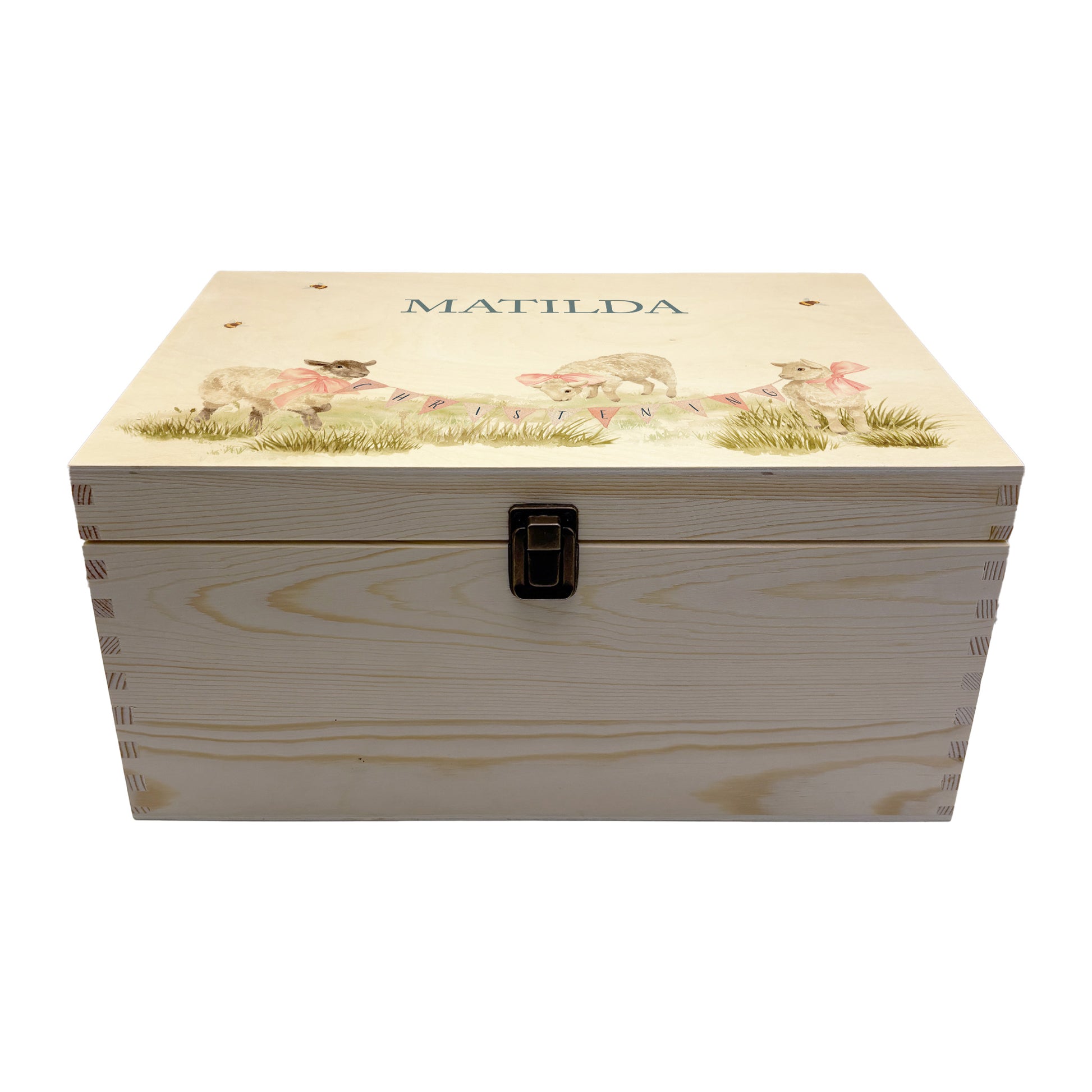 Large sized wooden pine personalised keepsake box. The design theme is perfect for New babies, Welcome to the world, baby showers and christenings. This design has baby lambs  in playing in grass with a little bee flying around.  This design can be personalised by adding a beautiful bunting and a luxurious bow around their necks in blue or pink. you can also add names , and special details about the special day or occasion.  Add the extra special touch to your special occasion.