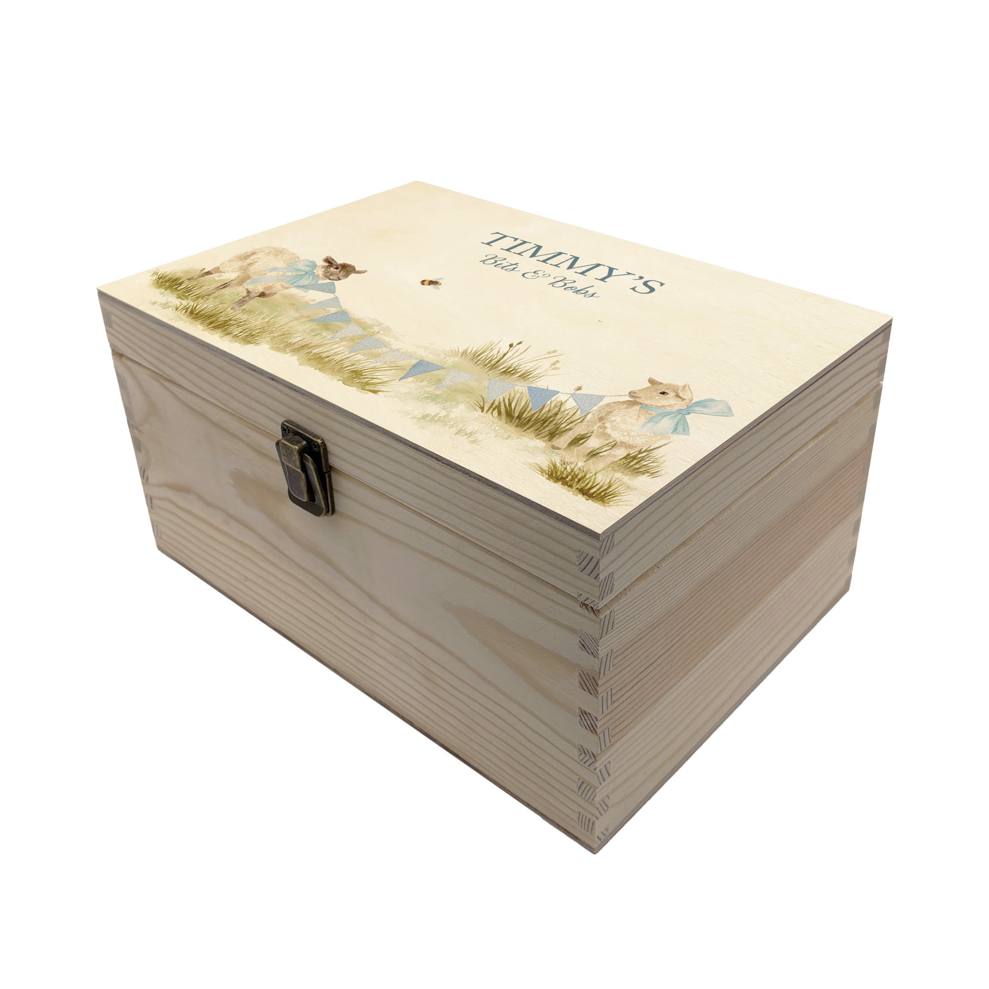 Medium sized wooden pine personalised keepsake box. The design theme is perfect for New babies, Welcome to the world, baby showers and christenings. This design has baby lambs  in playing in grass with a little bee flying around.  This design can be personalised by adding a beautiful bunting and a luxurious bow around their necks in blue or pink. you can also add names , and special details about the special day or occasion.  Add the extra special touch to your special occasion.