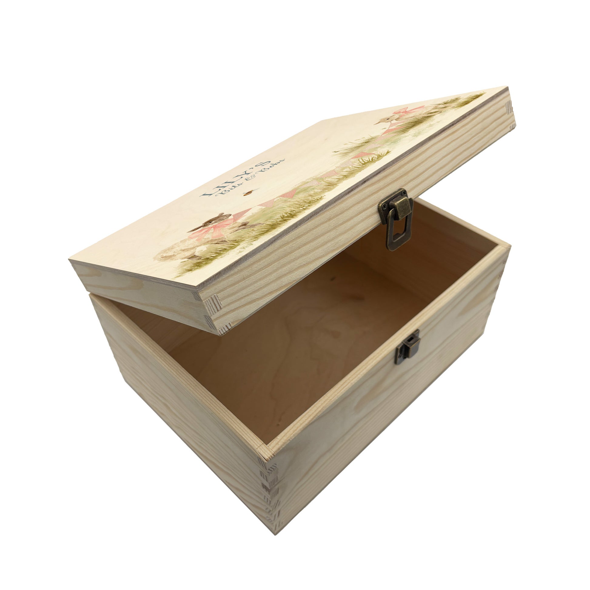 Medium sized wooden pine personalised keepsake box. The design theme is perfect for New babies, Welcome to the world, baby showers and christenings. This design has baby lambs  in playing in grass with a little bee flying around.  This design can be personalised by adding a beautiful bunting and a luxurious bow around their necks in blue or pink. you can also add names , and special details about the special day or occasion.  Add the extra special touch to your special occasion.
