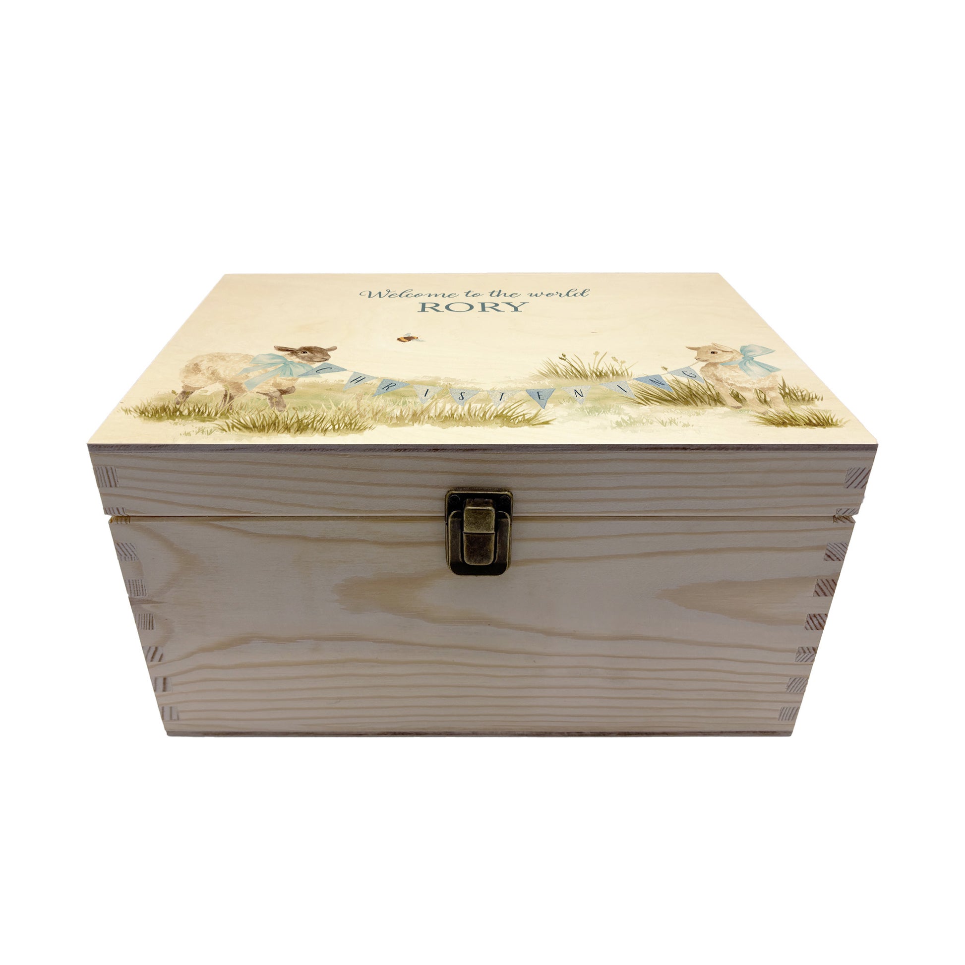 Medium sized wooden pine personalised keepsake box. The design theme is perfect for New babies, Welcome to the world, baby showers and christenings. This design has baby lambs  in playing in grass with a little bee flying around.  This design can be personalised by adding a beautiful bunting and a luxurious bow around their necks in blue or pink. you can also add names , and special details about the special day or occasion.  Add the extra special touch to your special occasion.