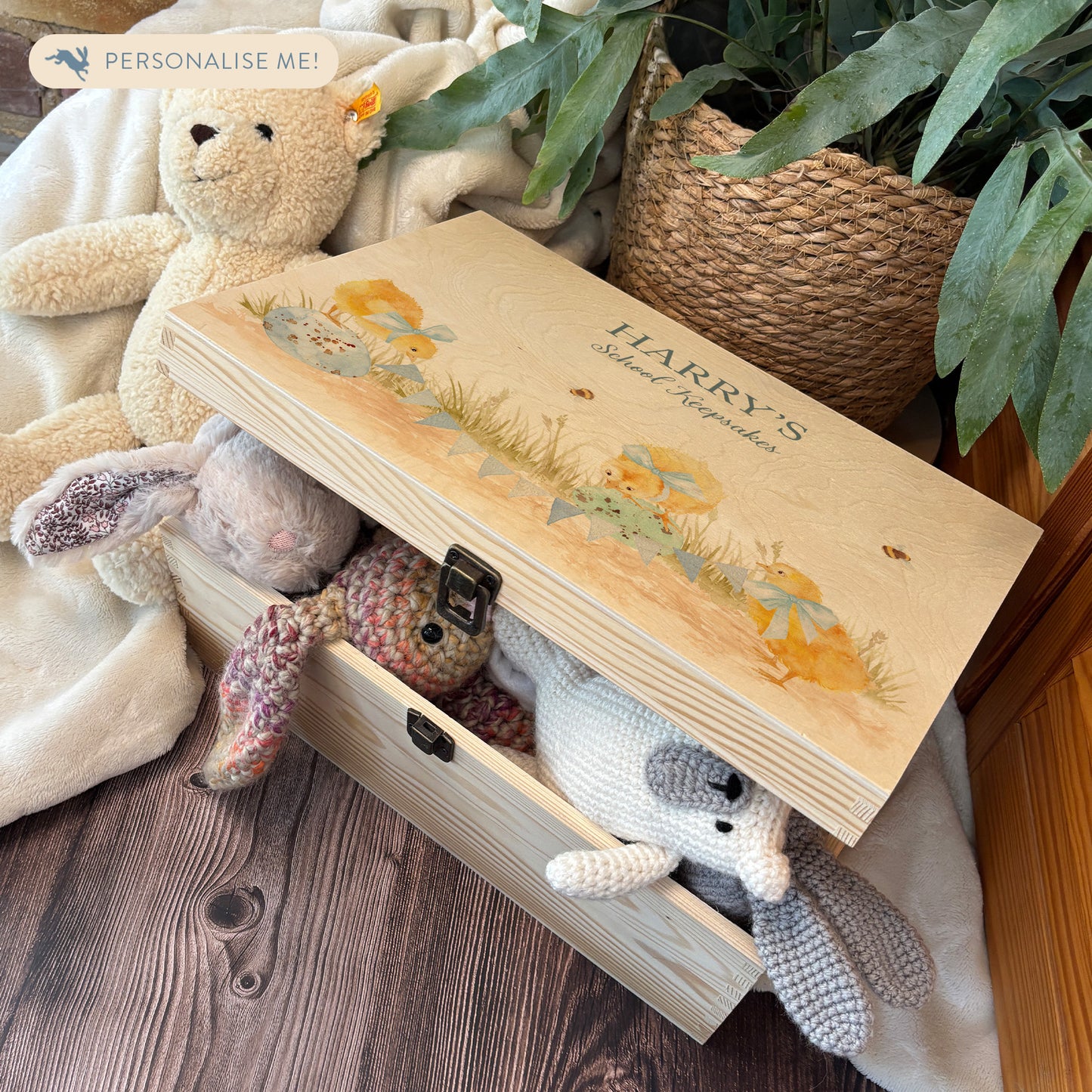 Large sized wooden pine personalised keepsake box. The design theme is perfect for New babies, Welcome to the world, baby showers and christenings. The picture also shows an example in a nursey room filled with nappies, vests and teddys.