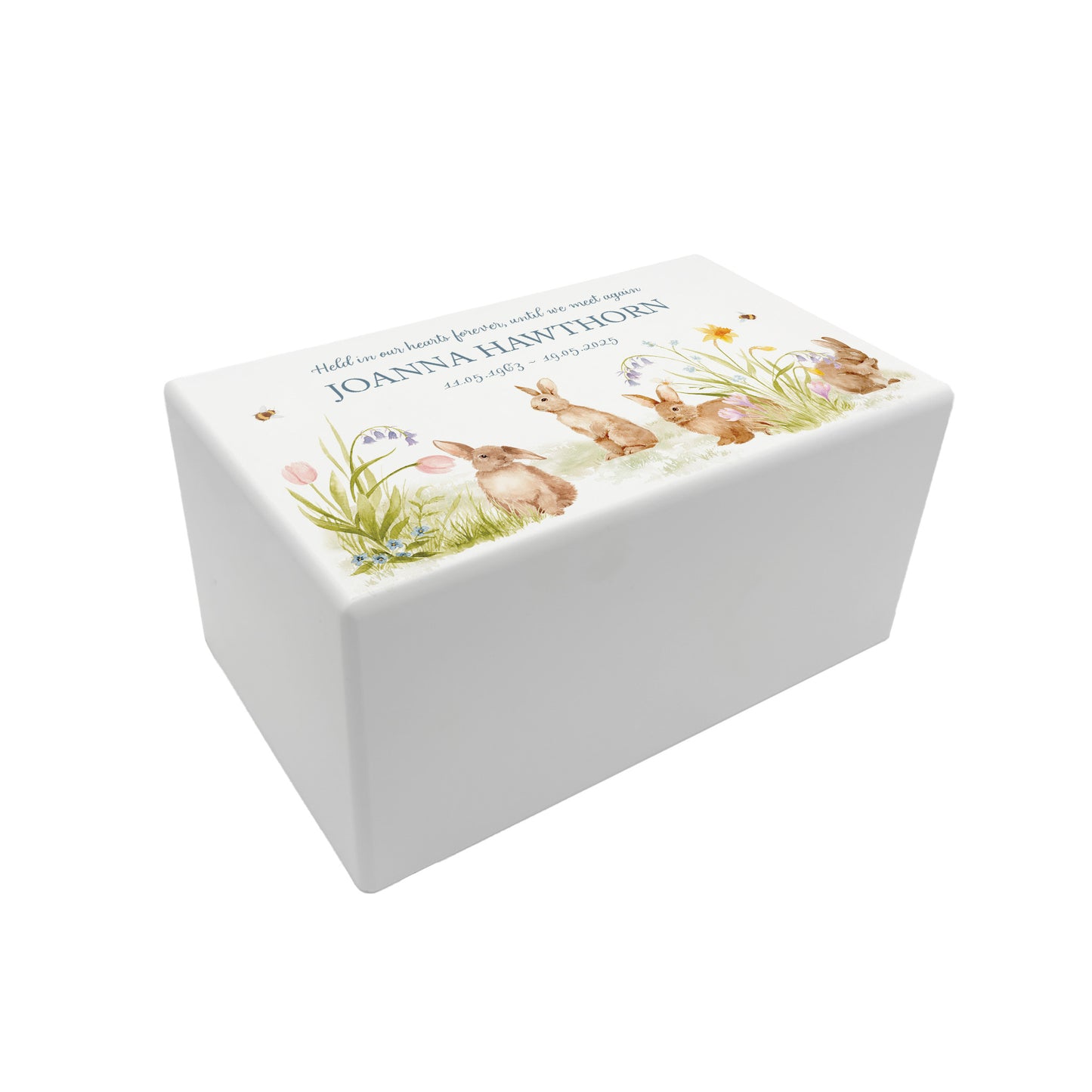 Luxury solid wooden white painted Urn , Featuring Bunnies in a flower meadow with buzzy bees, A watercolour illustration, our urns and Caskets for displaying or burying ashes. Customisable and can be personalised. Perfect funeral memory keepsake urn, for storing ashes for humans and pets.