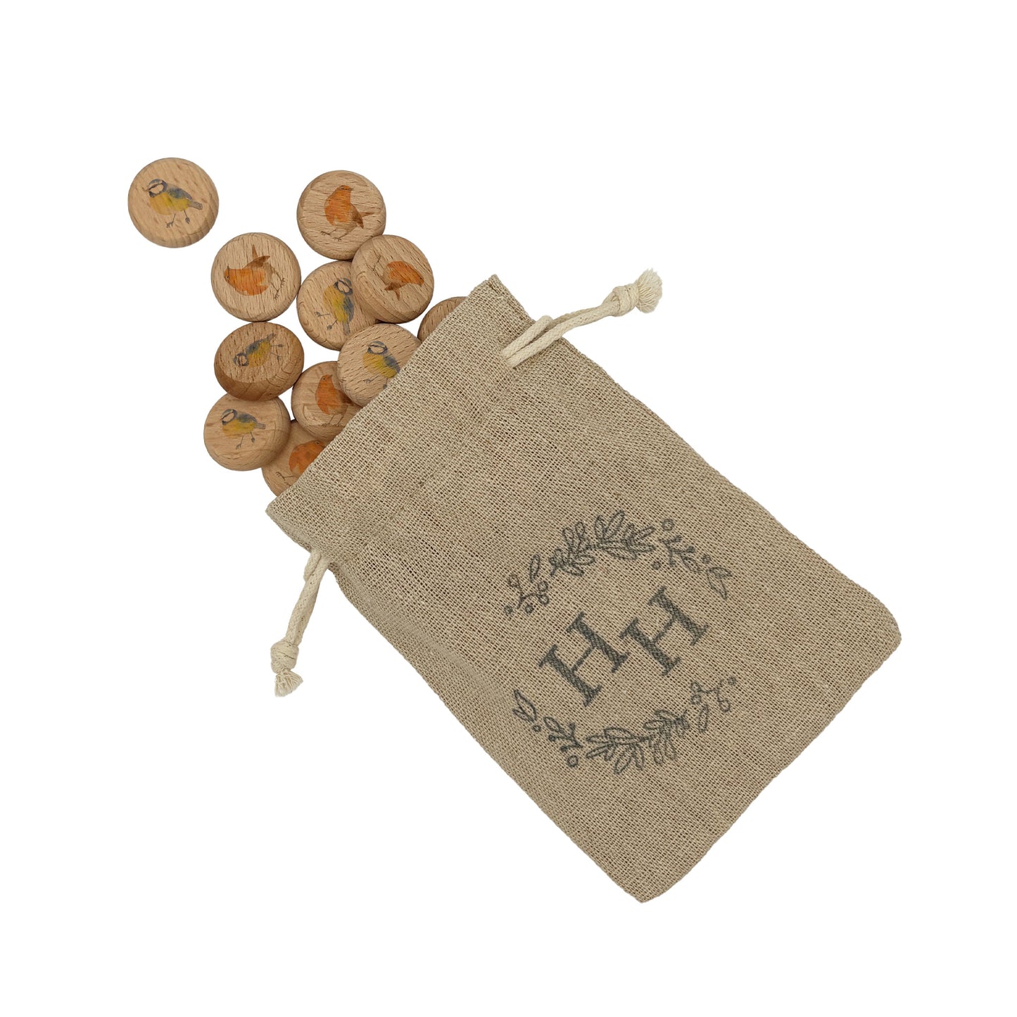A small cotton drawstring bag filled with wooden draughts or checkers counters that feature illustrations of British birds including robins and blue tits.