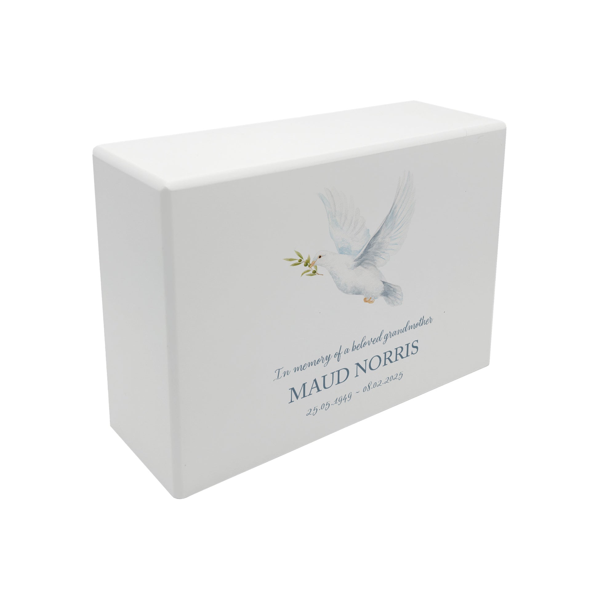 A beautifully crafted solid wooden urn, finished in white with a soft watercolour design of fa flying Dove. Thoughtfully made for either display or burial, this personalised urn can be customised to create a meaningful memorial. Perfect for holding ashes of a loved one or a beloved pet, it serves as a comforting tribute and keepsake.