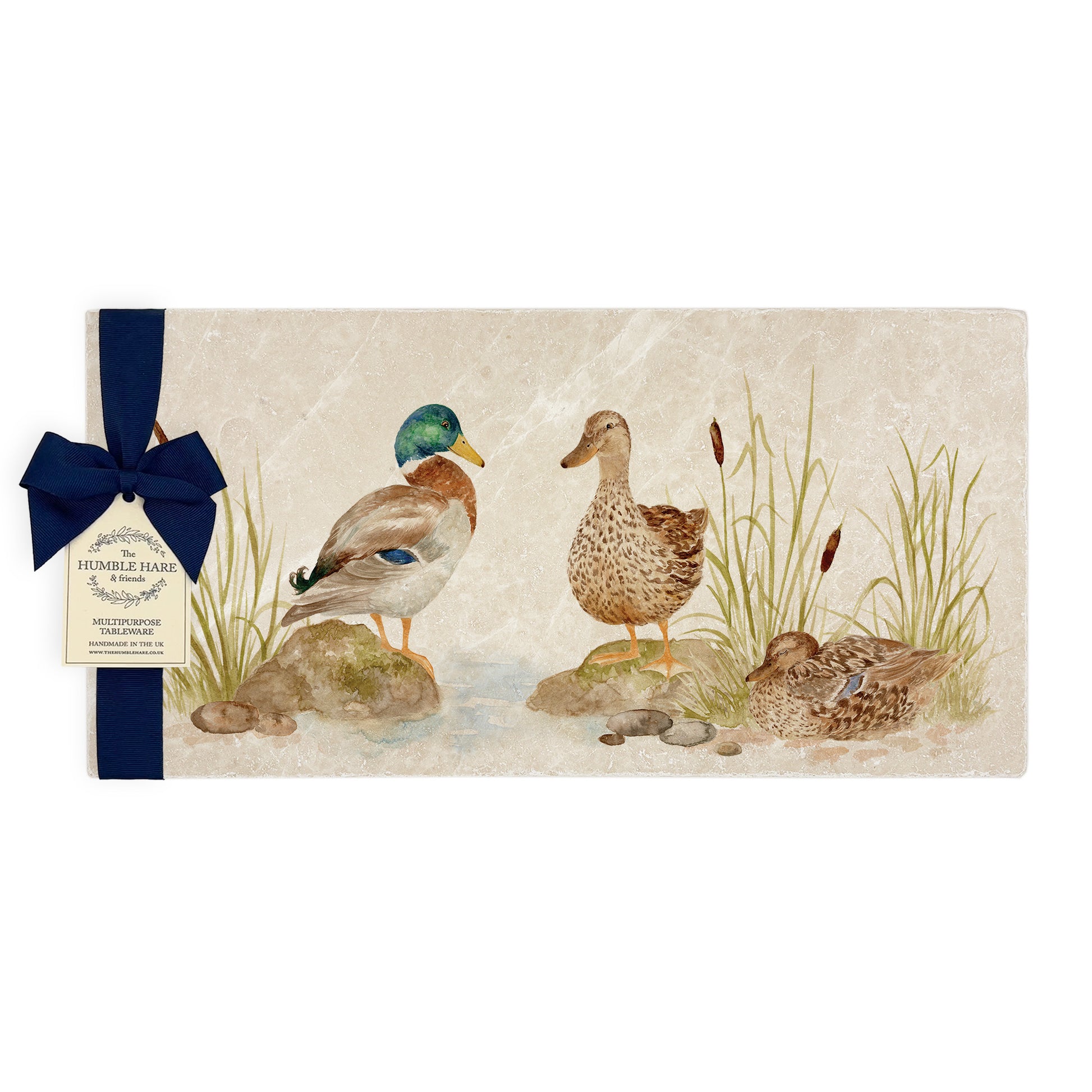 A multipurpose marble sharing platter with a watercolour mallard duck design, packaged with a luxurious dark blue bow and branded gift tag.