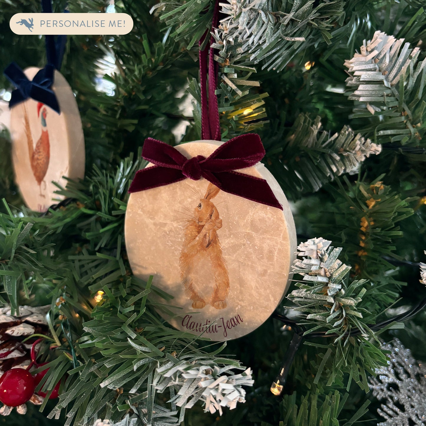 Introduce timeless elegance to your festive decorations with our oval-shaped marble baubles, featuring watercolour artwork inspired by nature. Whether you prefer them with or without Christmas hats, each bauble can be personalised and completed with a velvet ribbon in various colours.