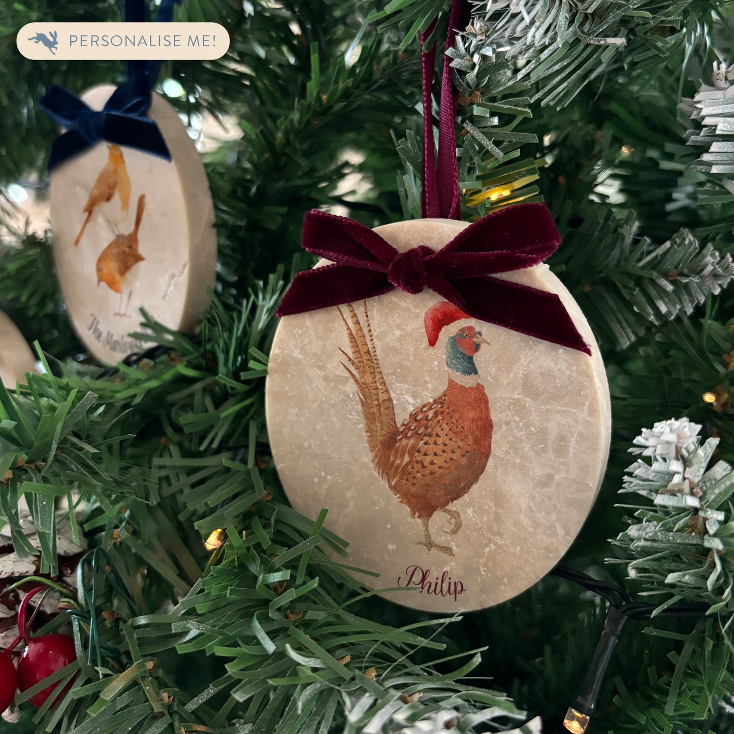 Our oval-shaped marble Christmas baubles combine elegant watercolour designs with a personalised touch. Available in various velvet ribbon colours, these beautifully crafted baubles are the perfect way to add a bespoke, nature-inspired accent to your festive décor.