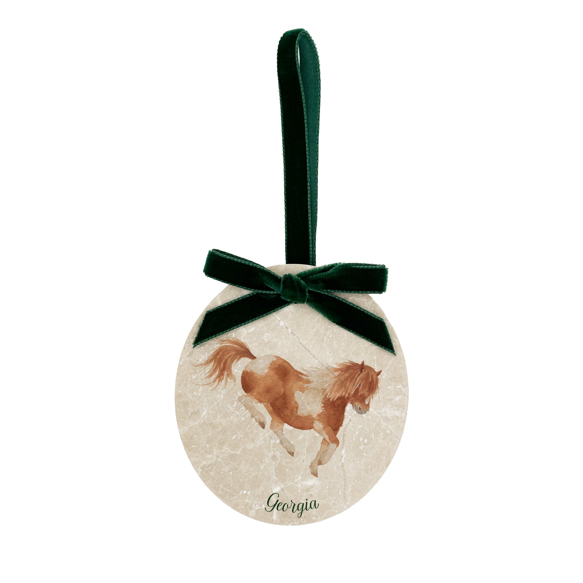 An oval marble bauble featuring a watercolour Shetland pony, personalised with your choice of text to create a Christmas decoration unique to you! The bauble is finished with a velvet ribbon.