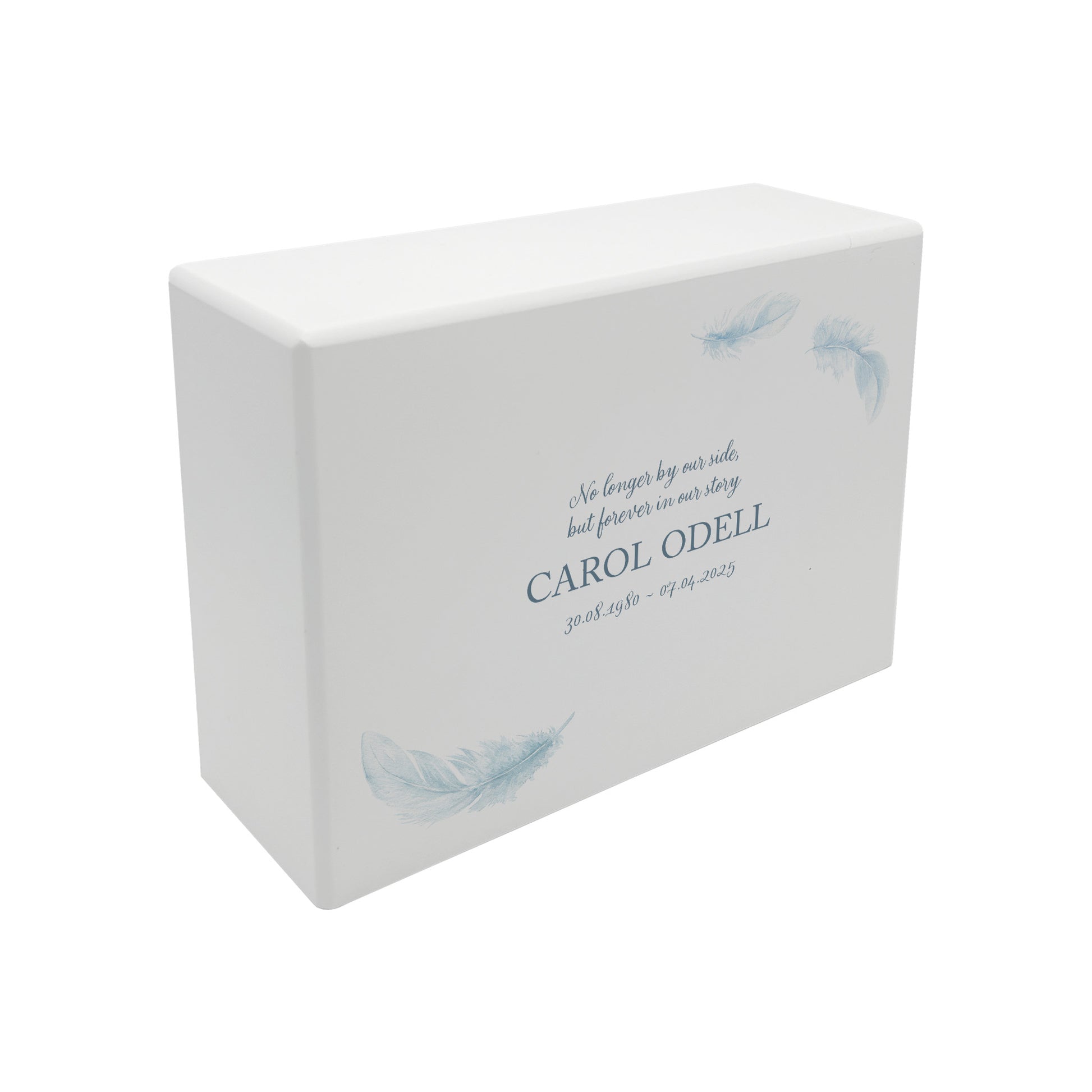 A beautifully crafted solid wooden urn, finished in white with a soft watercolour design of floating Feathers, Thoughtfully made for either display or burial, this personalised urn can be customised to create a meaningful memorial. Perfect for holding ashes of a loved one or a beloved pet, it serves as a comforting tribute and keepsake.