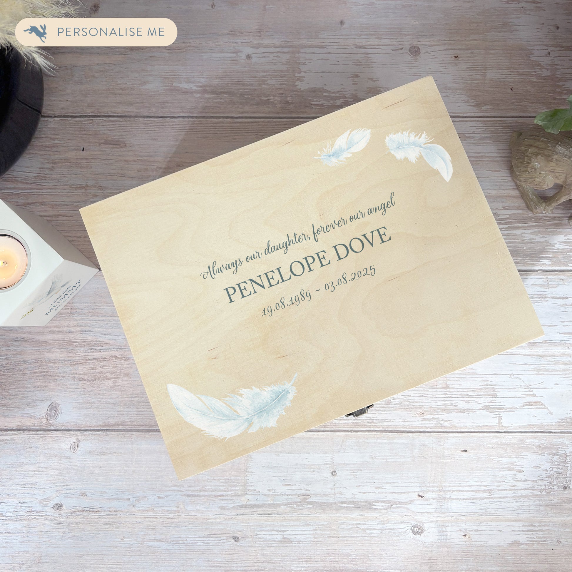 Wooden box with a decorative lid featuring illustrations of a Floating Feathers Perfect funeral memory keepsake box, for storing ashes, order of service, flowers. capturing your loved ones favourite hobby