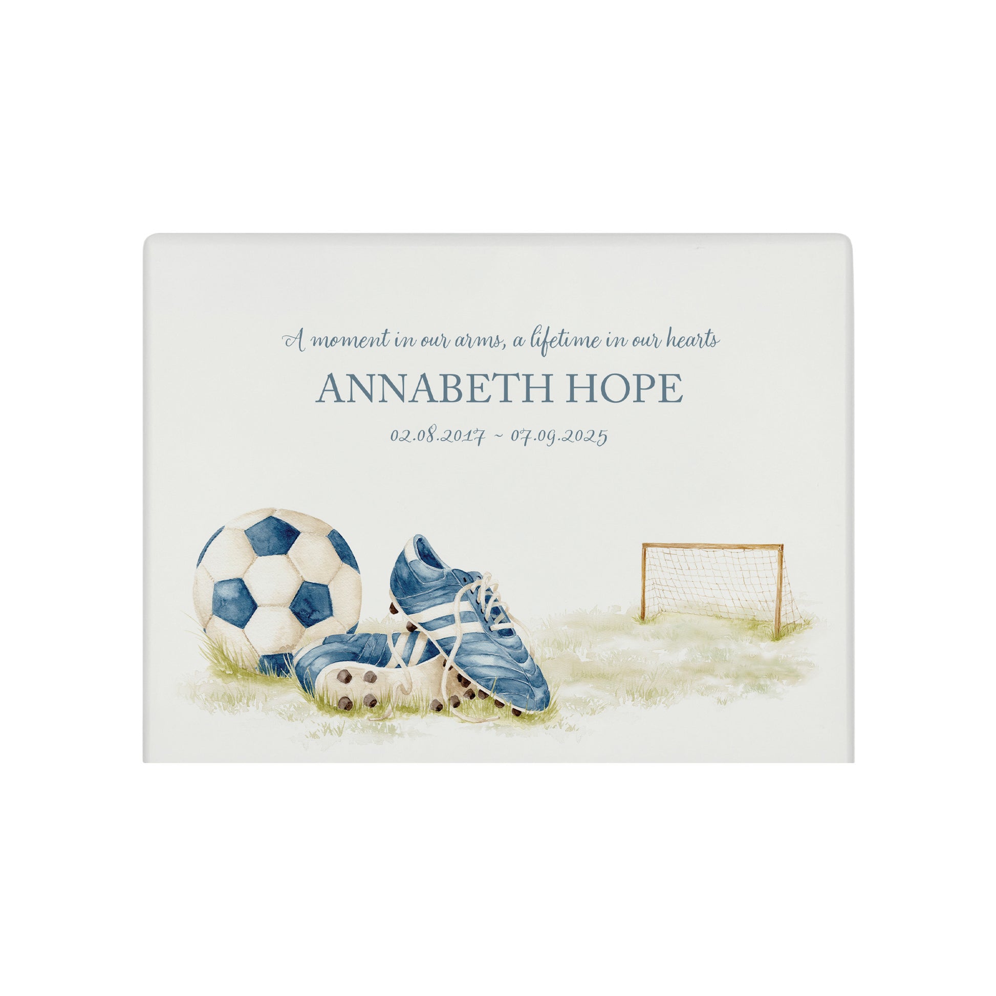 A beautifully crafted solid wooden urn, finished in white with a soft watercolour design of a Football and boots, Thoughtfully made for either display or burial, this personalised urn can be customised to create a meaningful memorial. Perfect for holding ashes of a loved one or a beloved pet, it serves as a comforting tribute and keepsake.
