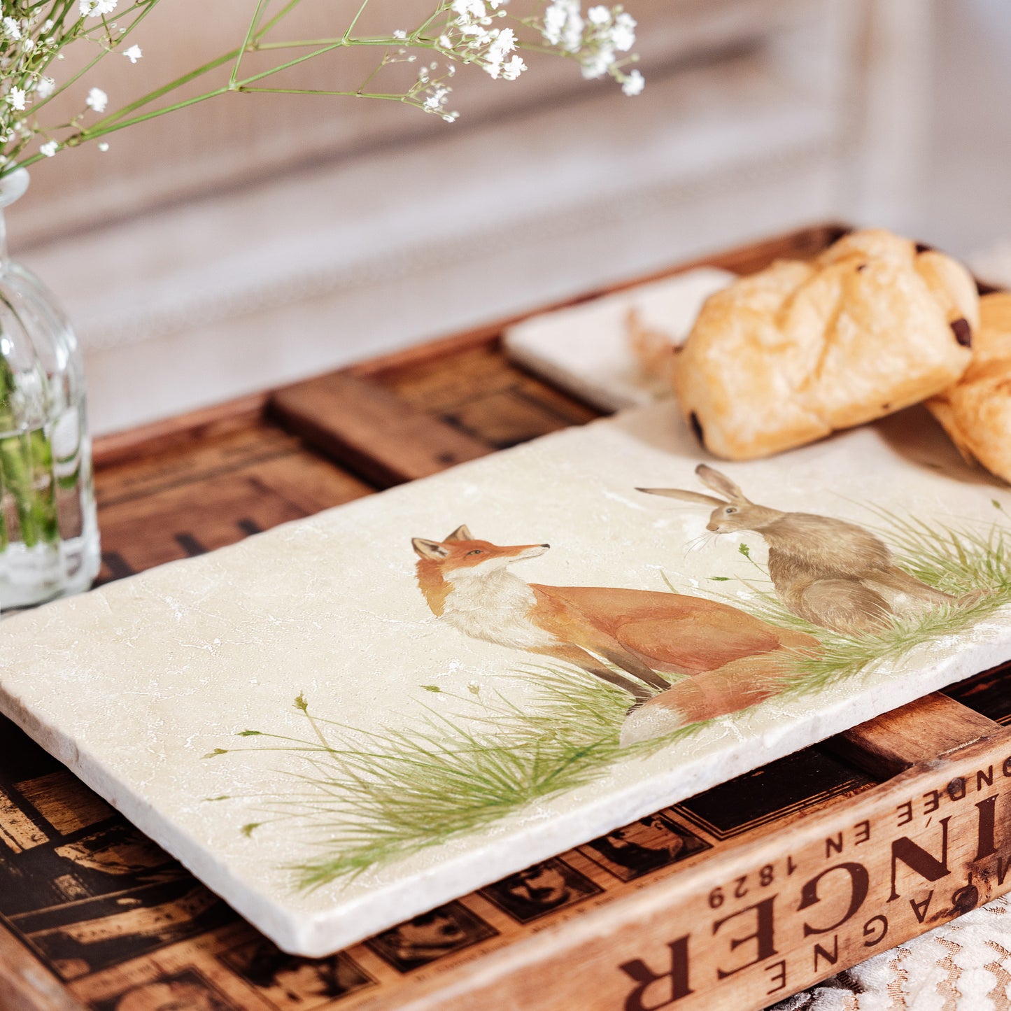 Water colour design featuring a Fox and Hare on our marble platter. Sat in a meadow style scenery. Some will question are they friend or Foe?