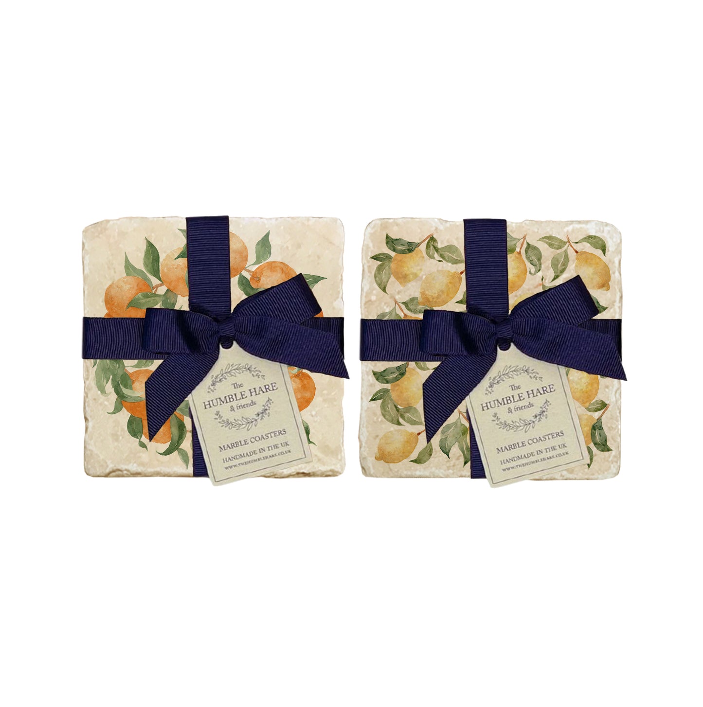 A set of 4 handmade marble coasters featuring mix and match fruit designs, packaged in 2 pairs, with a luxurious blue bow and gift tag.