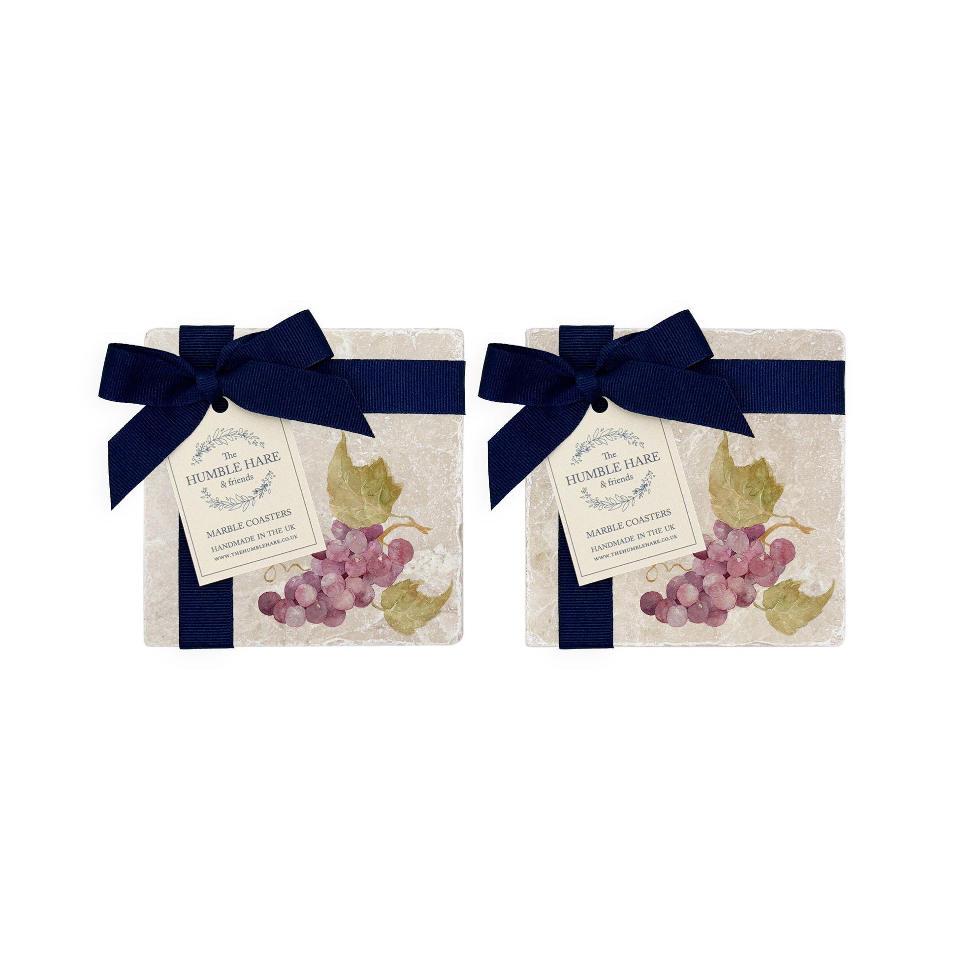 A set of 4 handmade marble coasters featuring a single watercolour bunch of grapes, packaged in 2 pairs, with a luxurious blue bow and gift tag.