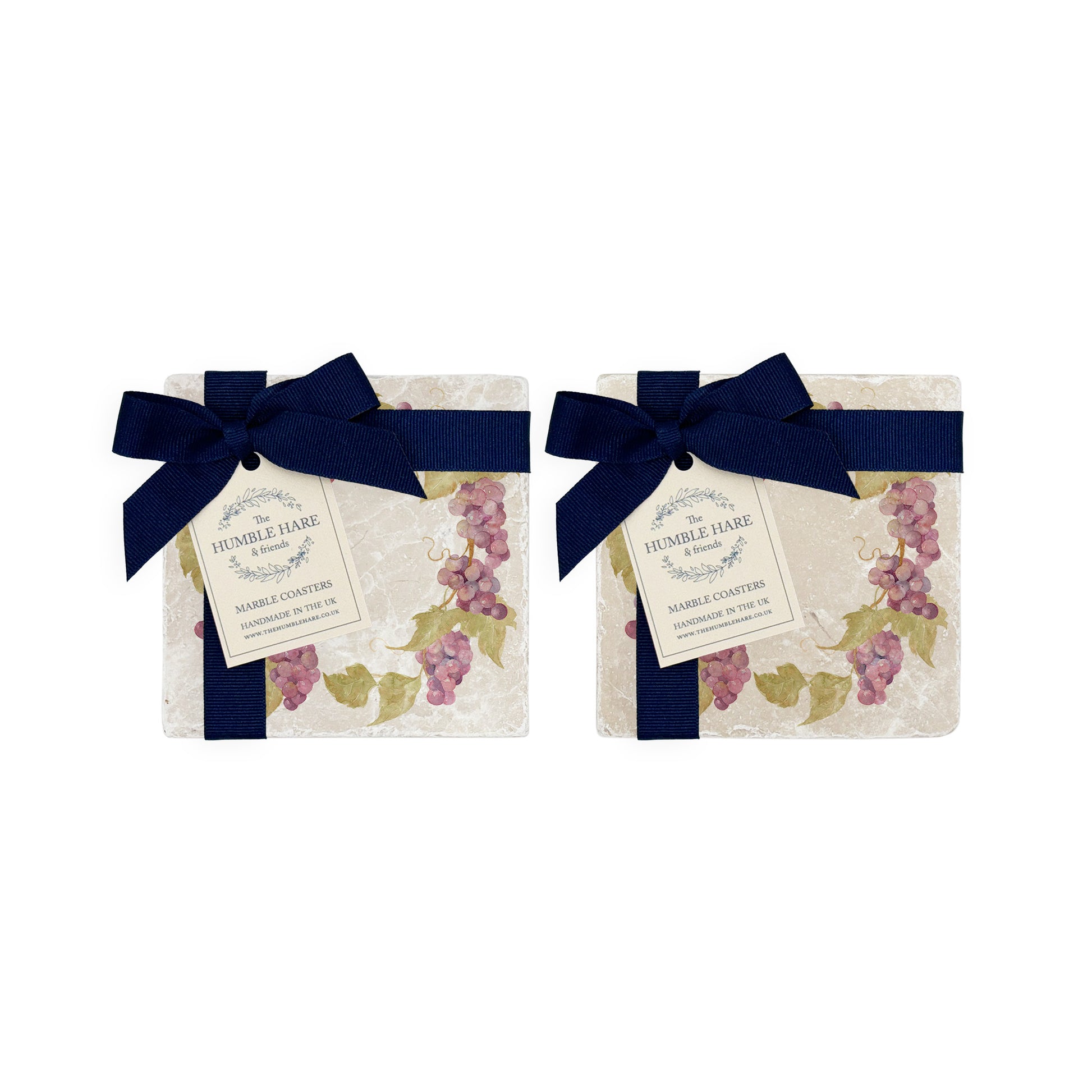 A set of 4 handmade marble coasters featuring a watercolour grape vine wreath design, packaged in 2 pairs, with a luxurious blue bow and gift tag.