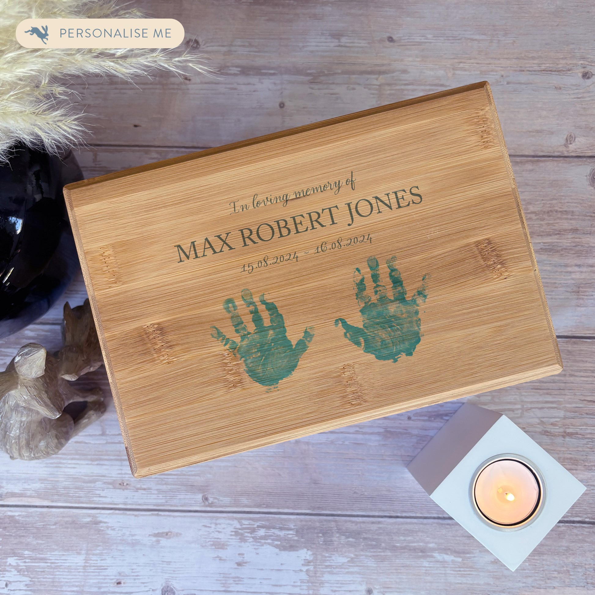 A beautifully crafted solid Bamboo wooden urn, personalised and finished with a soft watercolour design of a child's hand and footprints available in several colours. Thoughtfully made for either display or burial, this personalised urn can be customised to create a meaningful memorial. Perfect for holding ashes of a loved one or a beloved pet, it serves as a comforting tribute and keepsake. Coping with the loss of a child and keeping their memory alive.