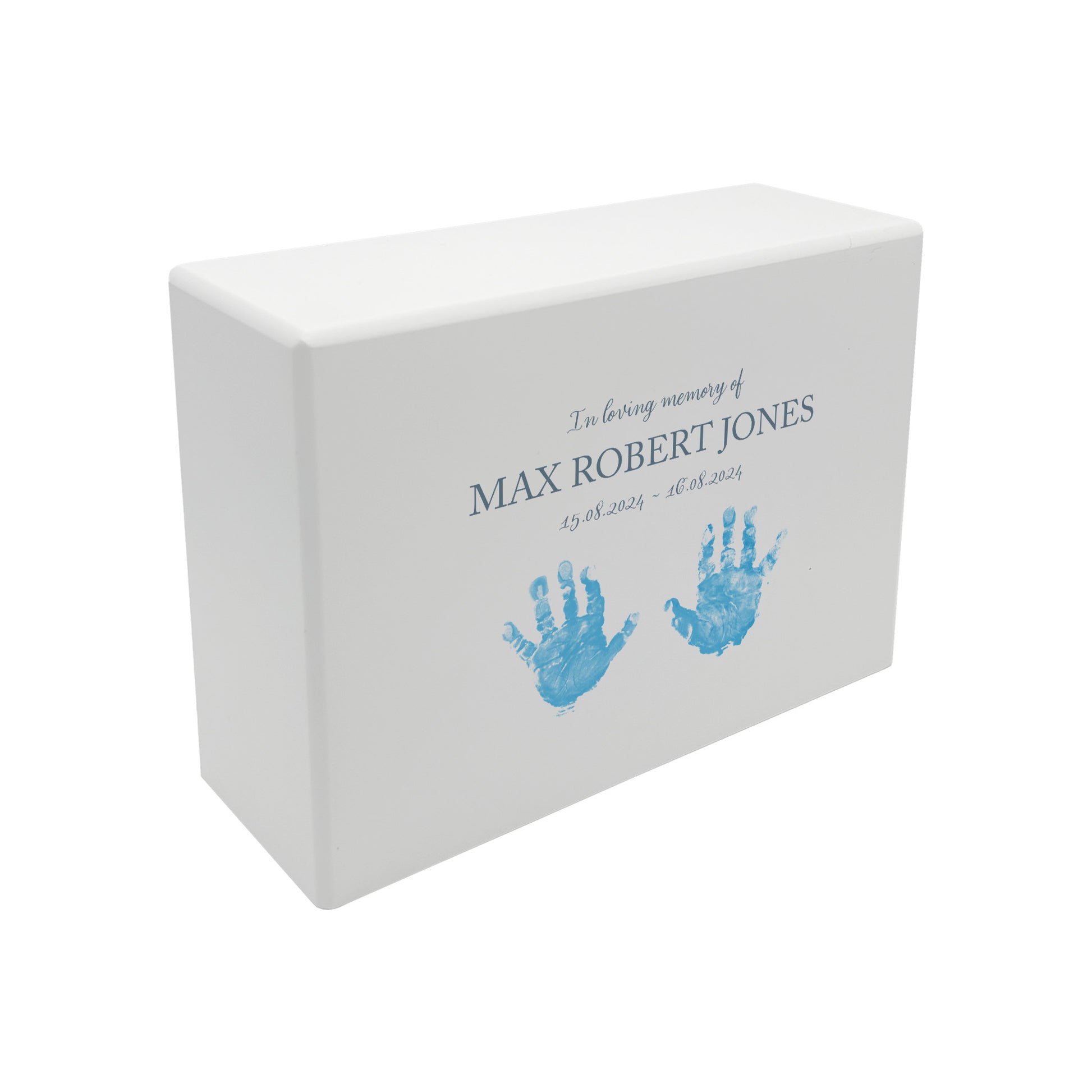 A beautifully crafted solid wooden urn, finished in white with a soft watercolour design of baby's handprints and footprints, Thoughtfully made for either display or burial, this personalised urn can be customised to create a meaningful memorial. Perfect for holding ashes of a loved one or a beloved pet, it serves as a comforting tribute and keepsake. Helping with baby loss