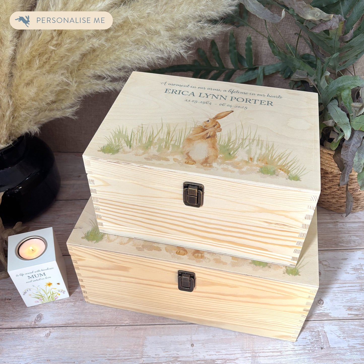 Wooden box with a decorative lid featuring animal illustrations on a wooden background. Perfect funeral memory keepsake box, for storing ashes, order of service, flowers, pictures.