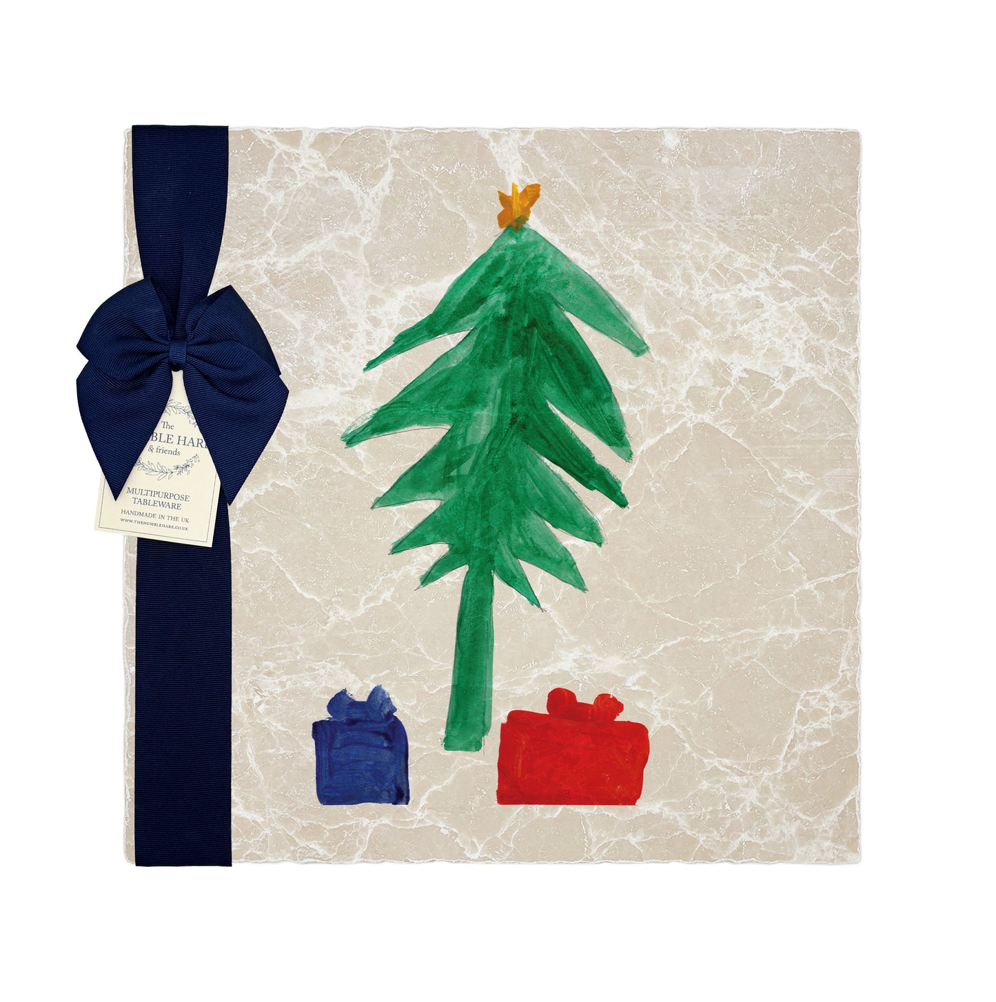 A child’s drawing on a marble tile, a personalized keepsake gift for parents and family members. The marble tile is packaged with a luxurious blue bow and gift tag.