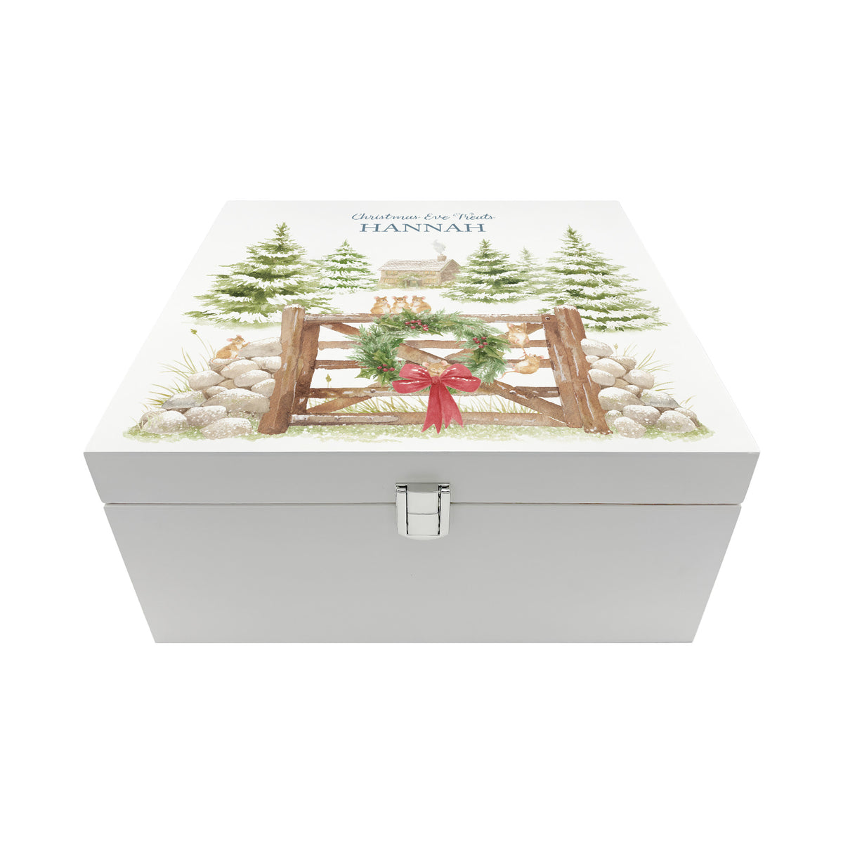 The front of a white wooden Christmas Eve gift box with a winter scene of mice playing on a cottage gate in a snowy forest watercolour illustration, the box is personalised with a name and Merry Christmas phrase.