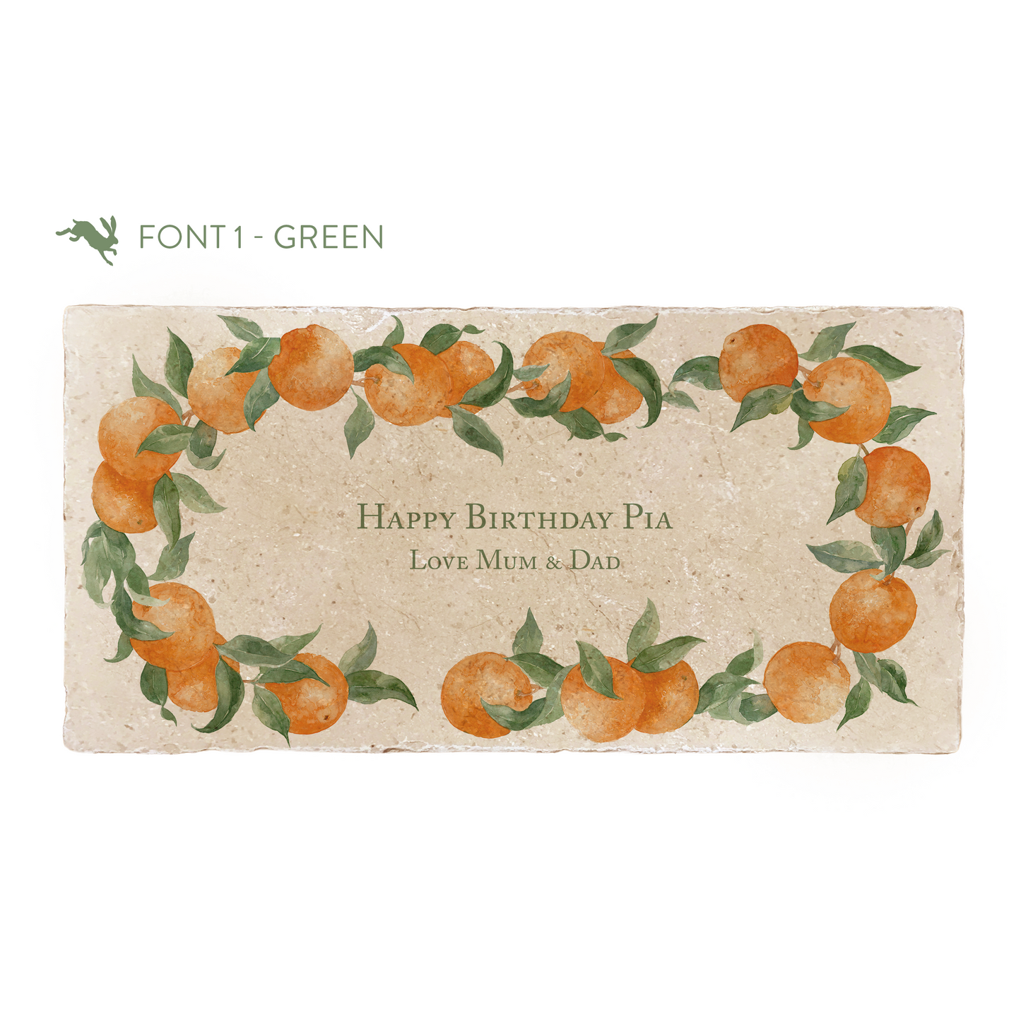 A marble sharing platter featuring a wreath of oranges and leaves, personalised with the bespoke message ‘Happy Birthday Pia Love Mum & Dad' in the centre of the platter in a green font.