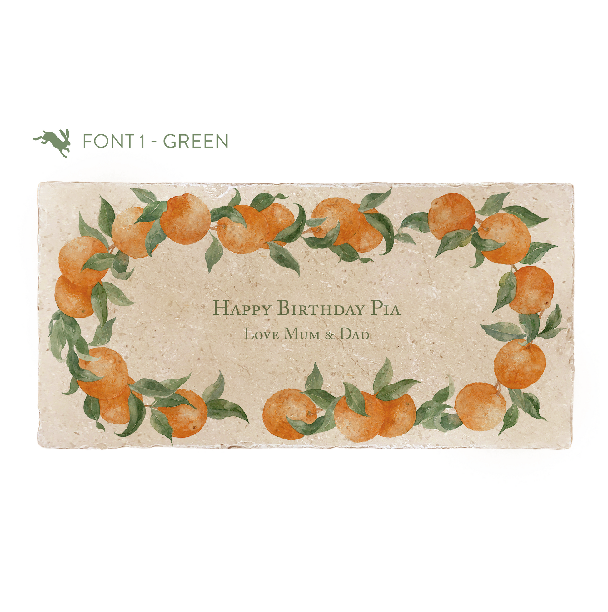 A marble sharing platter featuring a wreath of oranges and leaves, personalised with the bespoke message ‘Happy Birthday Pia Love Mum & Dad' in the centre of the platter in a green font.