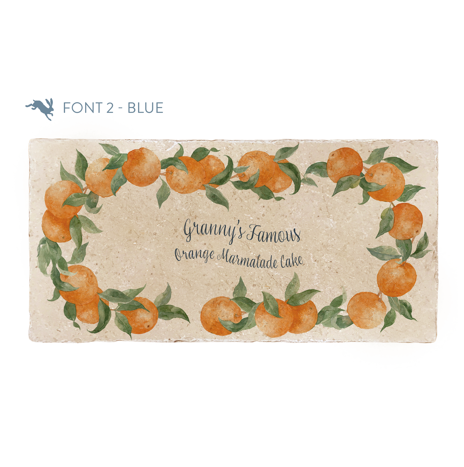 A marble sharing platter featuring a wreath of oranges and leaves, personalised with the bespoke message ‘Granny’s Favourite Orange Marmalade Cake’ in the centre of the platter in a blue calligraphy font.
