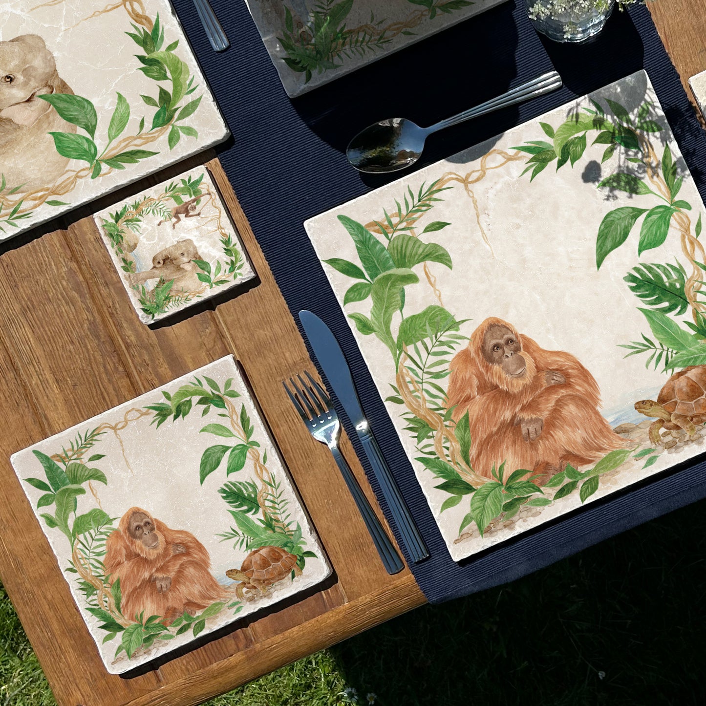 Welcoming our Rainforest Design, surrounded by the rainforest leaves and vines. Our Orangutan and Tortoise sitting a quiet corner of the rainforest. Illustrated in our original watercolour designs on Medium Serving Platter.