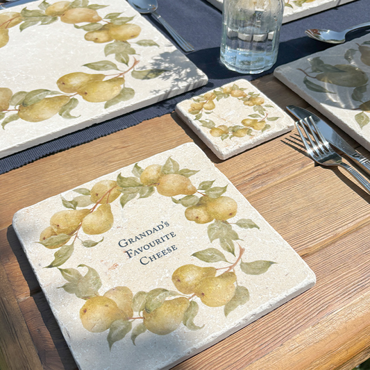 A medium marble cheese board personalised with the bespoke message ‘Grandad’s Favourite Cheese’.