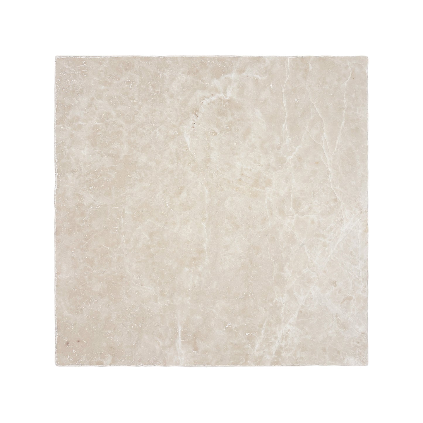 A large square cream marble tile 30.5 x 30.5cm.