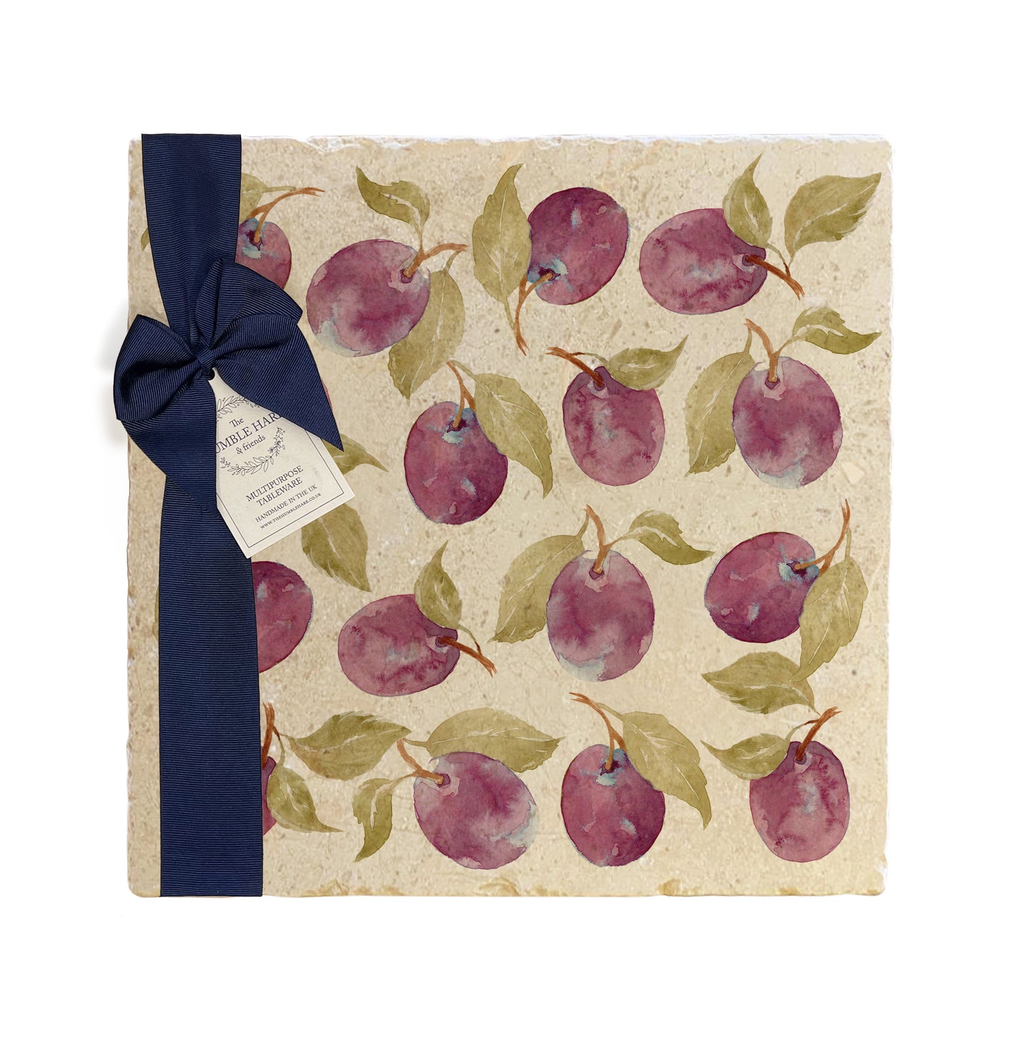 A large multipurpose marble platter with a watercolour plum pattern, packaged with a luxurious dark blue bow and branded gift tag.