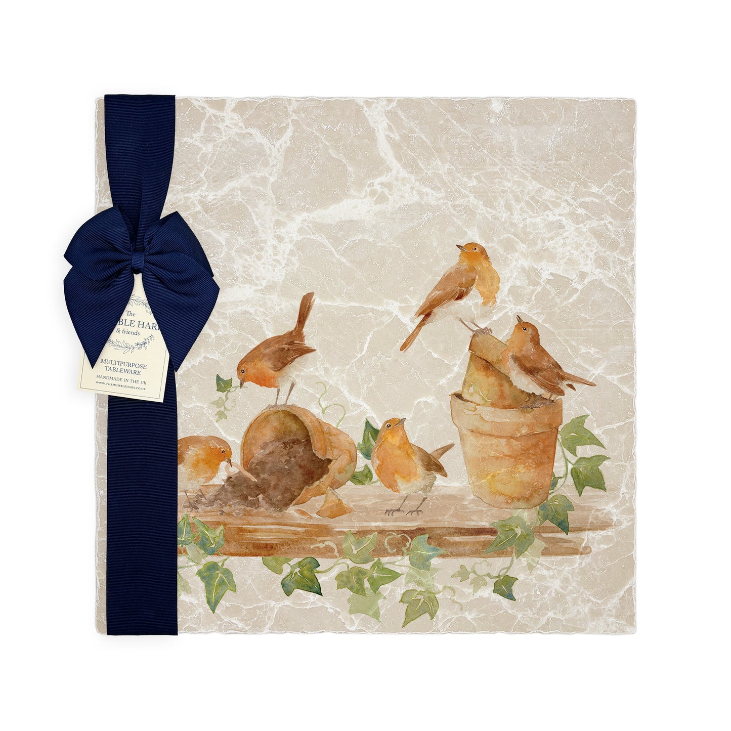 A large multipurpose marble platter with a watercolour robin design, packaged with a luxurious dark blue bow and branded gift tag.