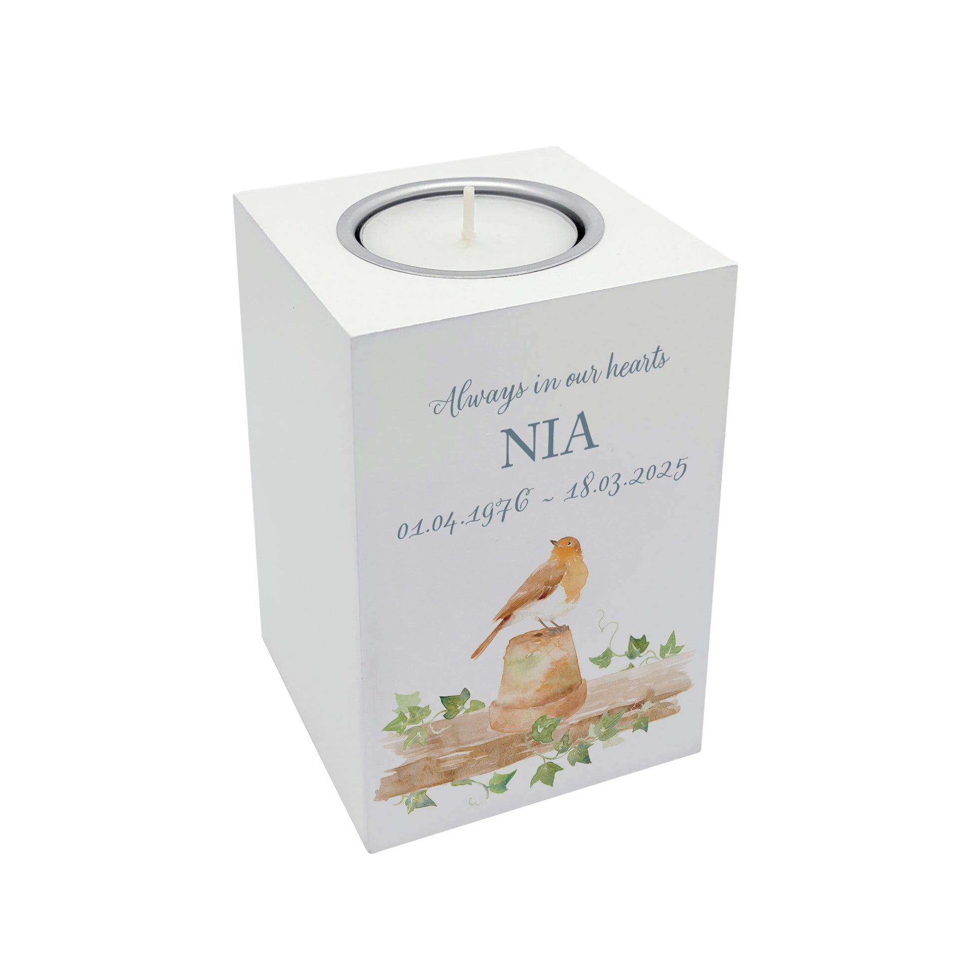 wooden cuboid luxury tealight holder with gorgeous personalised options . Each product is lovingly designed, handmade with our Countryside inspired watercolour designs. This design features a Robin sat on a pot,  unique designs to remember a loved on, great for memorial occasions. When a loved one is near a Robin shall appear.
