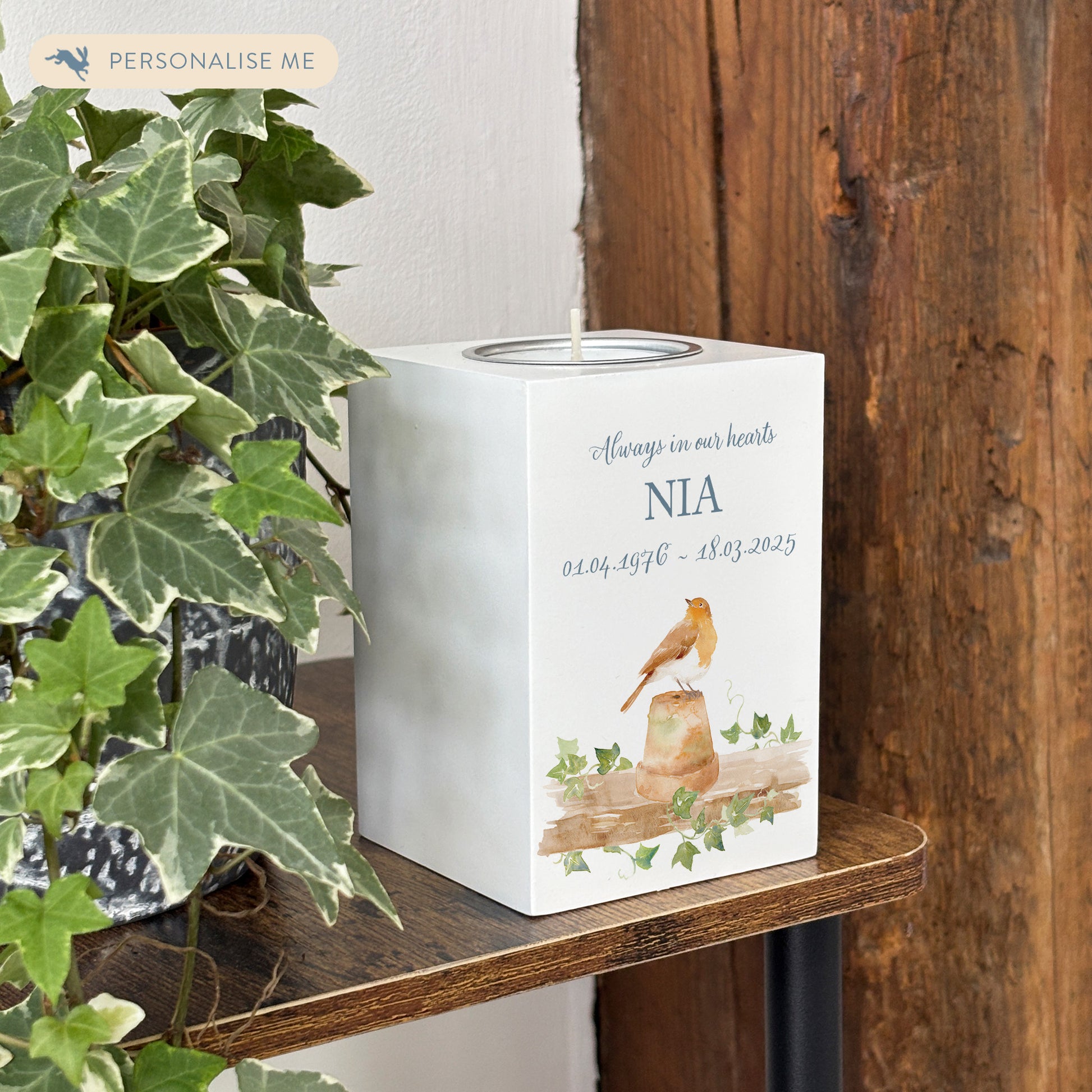 wooden cuboid luxury tealight holder with gorgeous personalised options . Each product is lovingly designed, handmade with our Countryside inspired watercolour designs. This design features a Robin sat on a pot,  unique designs to remember a loved on, great for memorial occasions. When a loved one is near a Robin shall appear.