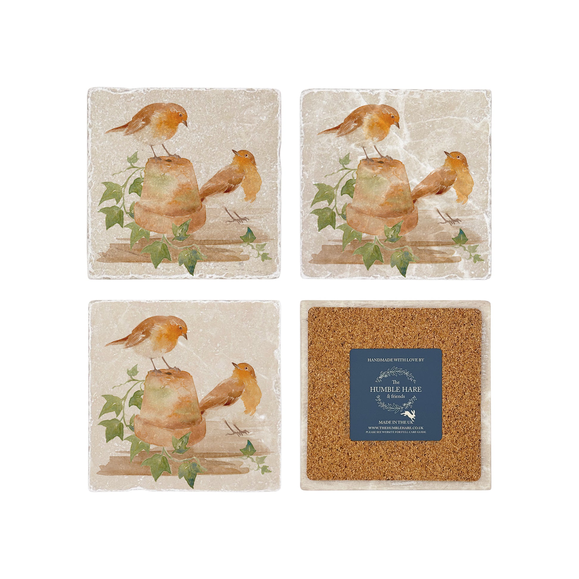 A set of 4 handmade marble coasters, featuring a watercolour robin design. One coaster is flipped to show that the coasters are backed with cork.