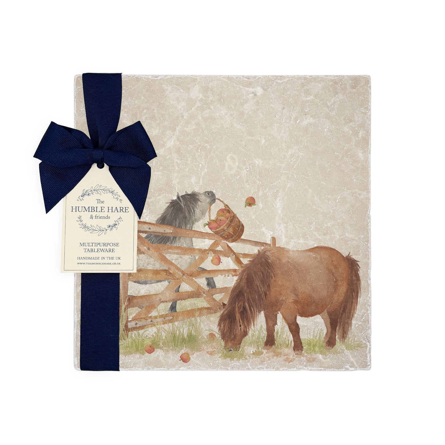 A medium multipurpose marble platter with a watercolour Shetland pony design, packaged with a luxurious dark blue bow and branded gift tag.