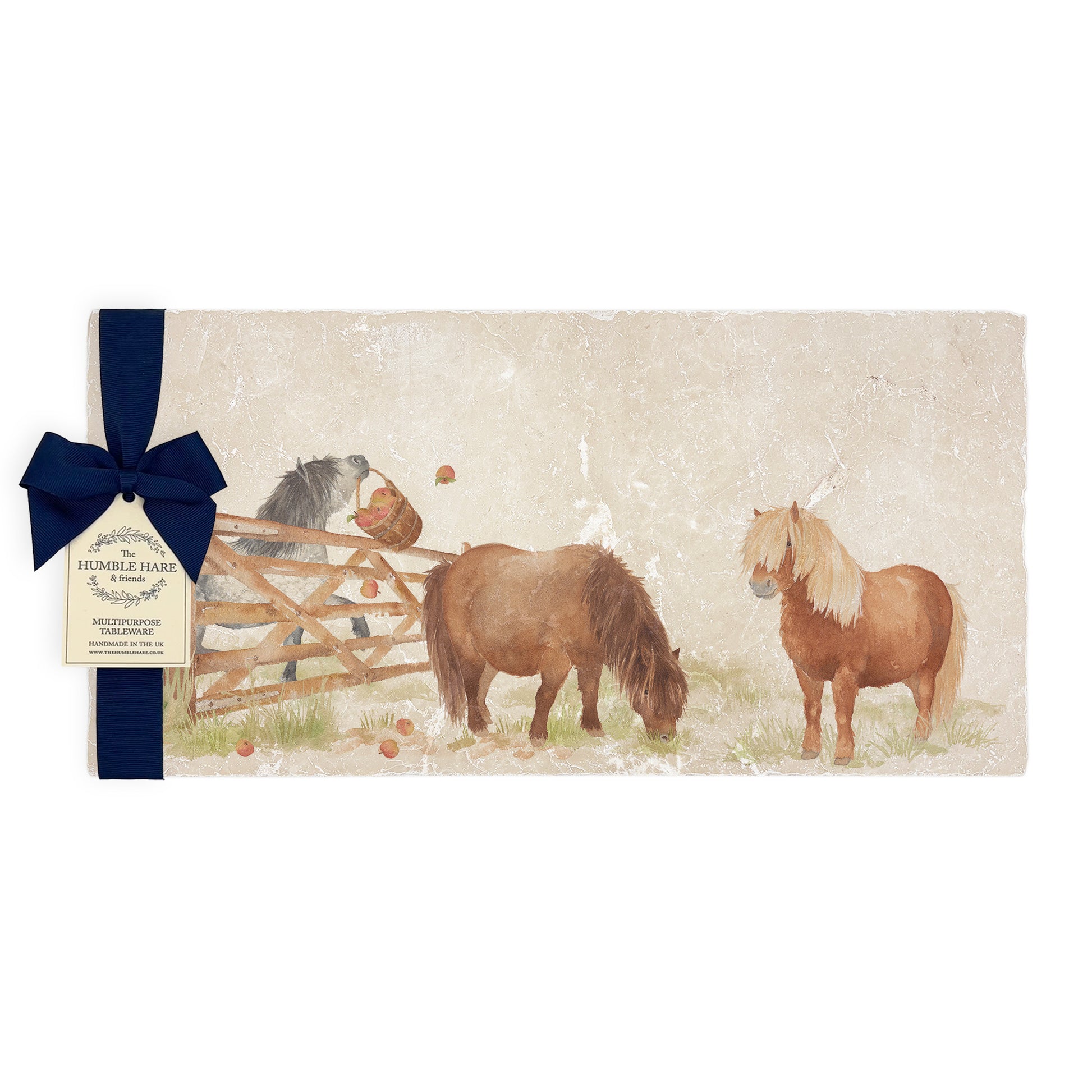 A multipurpose marble sharing platter with a watercolour Shetland pony design, packaged with a luxurious dark blue bow and branded gift tag.