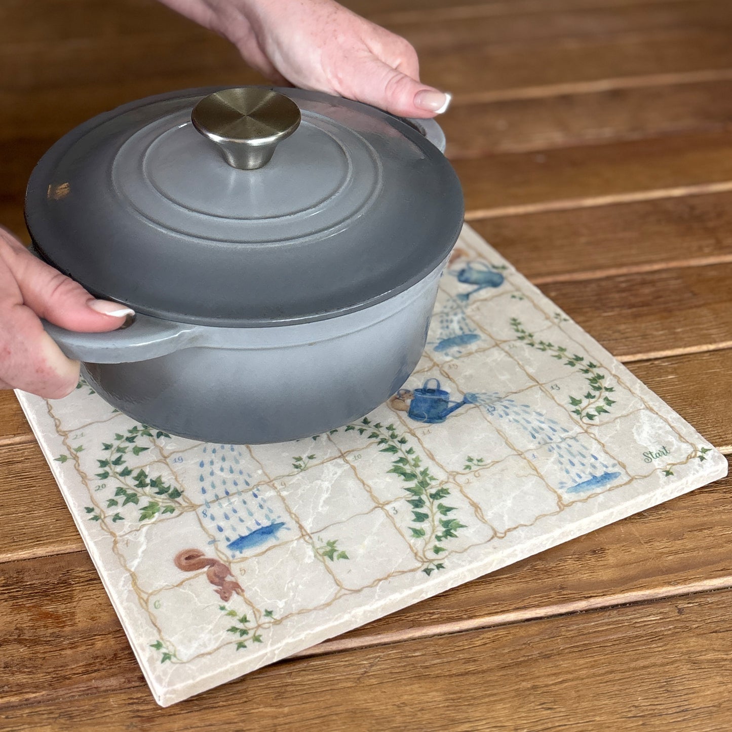 Luxury Snakes and Ladders board game handcrafted from natural marble stone, showcasing intricate detailing and timeless craftsmanship. After play your games board turns into a handy worktop/table protector.