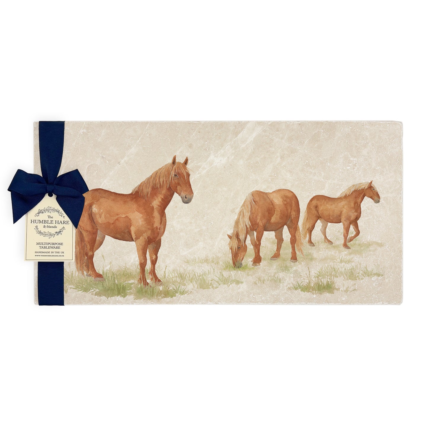 A multipurpose marble sharing platter with a watercolour Suffolk Punch horse, packaged with a luxurious dark blue bow and branded gift tag.