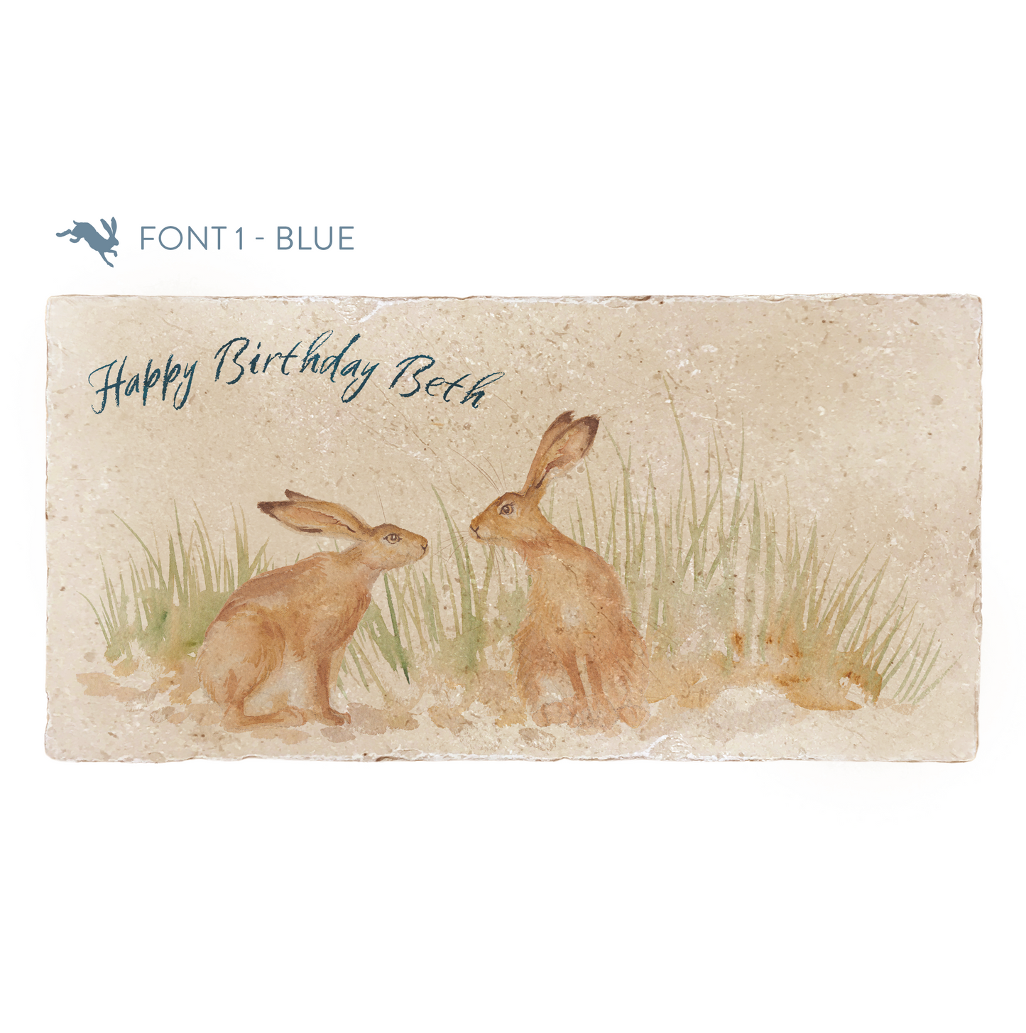 A personalised rectangular marble sharing platter featuring two kissing hares in a watercolour style. The example personalised dark blue text reads ‘Happy Birthday Beth’ in a brush script font.
