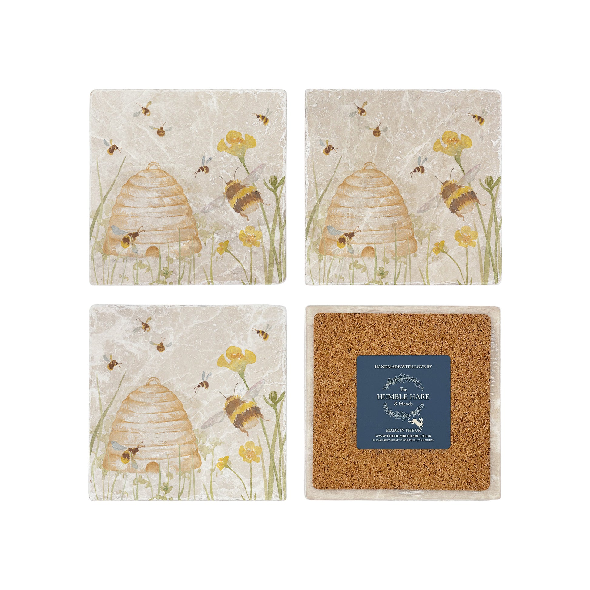 A set of 4 square marble coasters, featuring a watercolour design of bees and a beehive in a buttercup meadow. One coaster is flipped to show that the coasters are backed with cork.