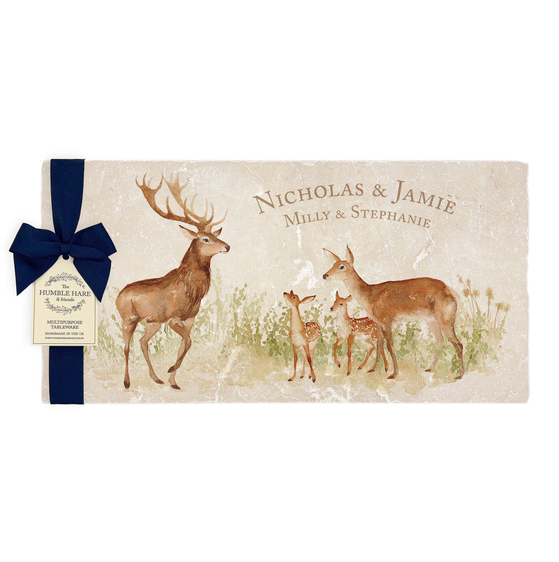 A personalised marble sharing platter featuring a family of deer a watercolour style, packaged with a luxurious dark blue bow and branded gift tag.