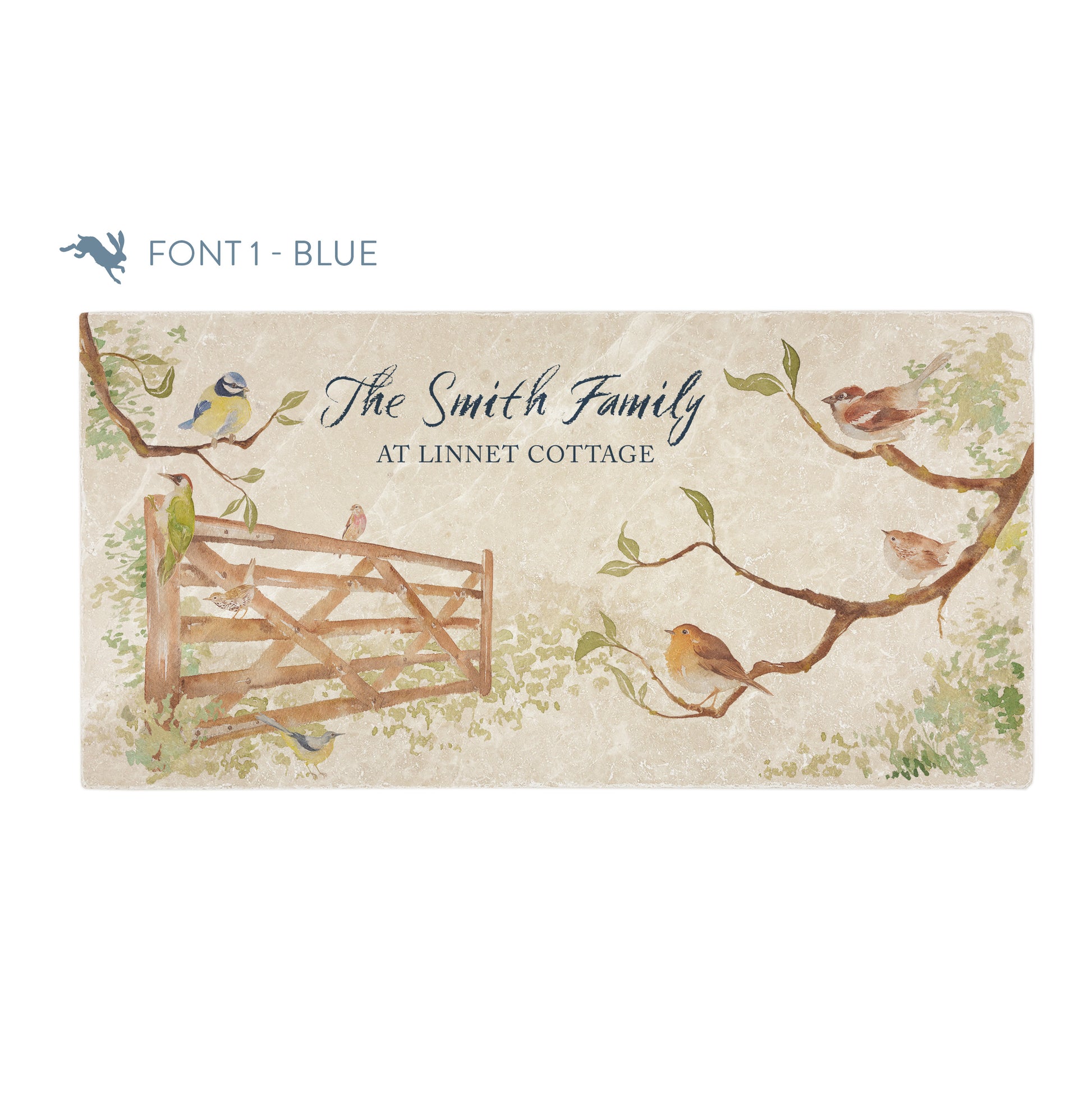 A personalised rectangular marble sharing platter featuring garden birds in the hedgerow around a paddock gate in a watercolour style. The example personalised dark blue text reads ‘The Smith Family at Linnet Cottage!’ in a brush script font.