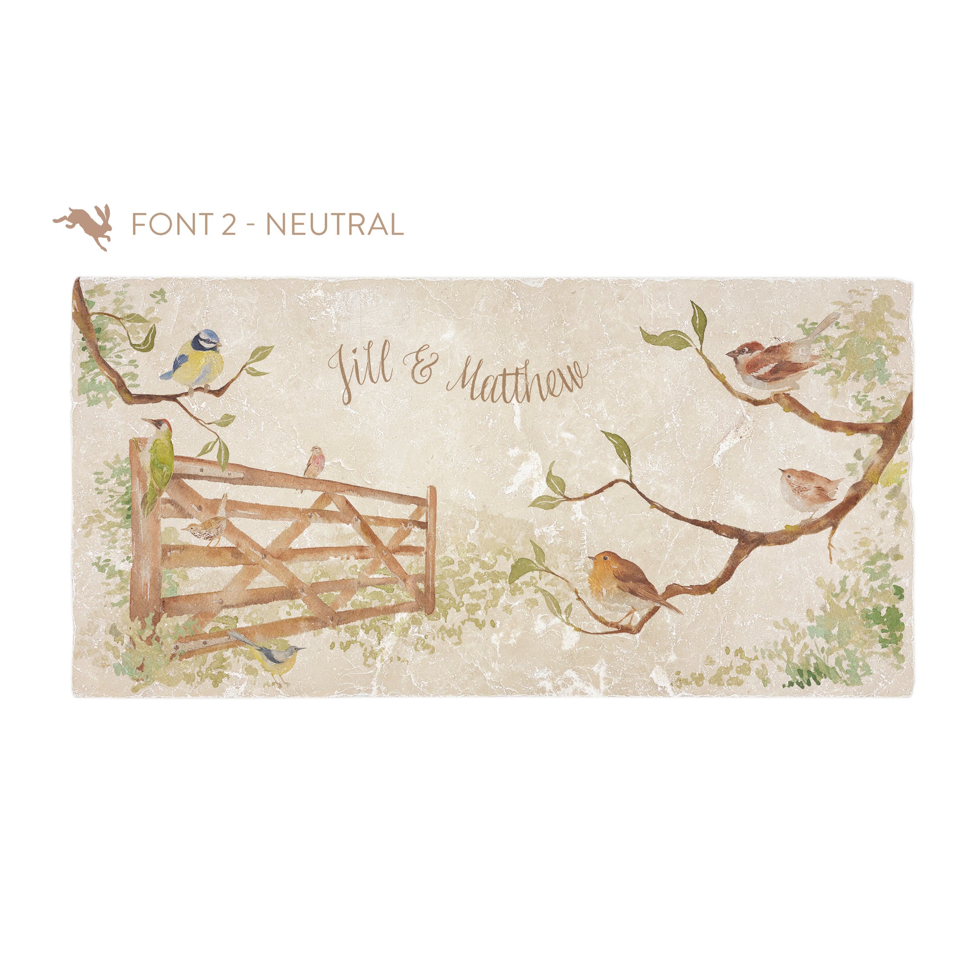 A personalised rectangular marble sharing platter featuring garden birds in the hedgerow around a paddock gate in a watercolour style. The example personalised neutral colour text reads ‘Jill & Matthew’ in a brush script font.
