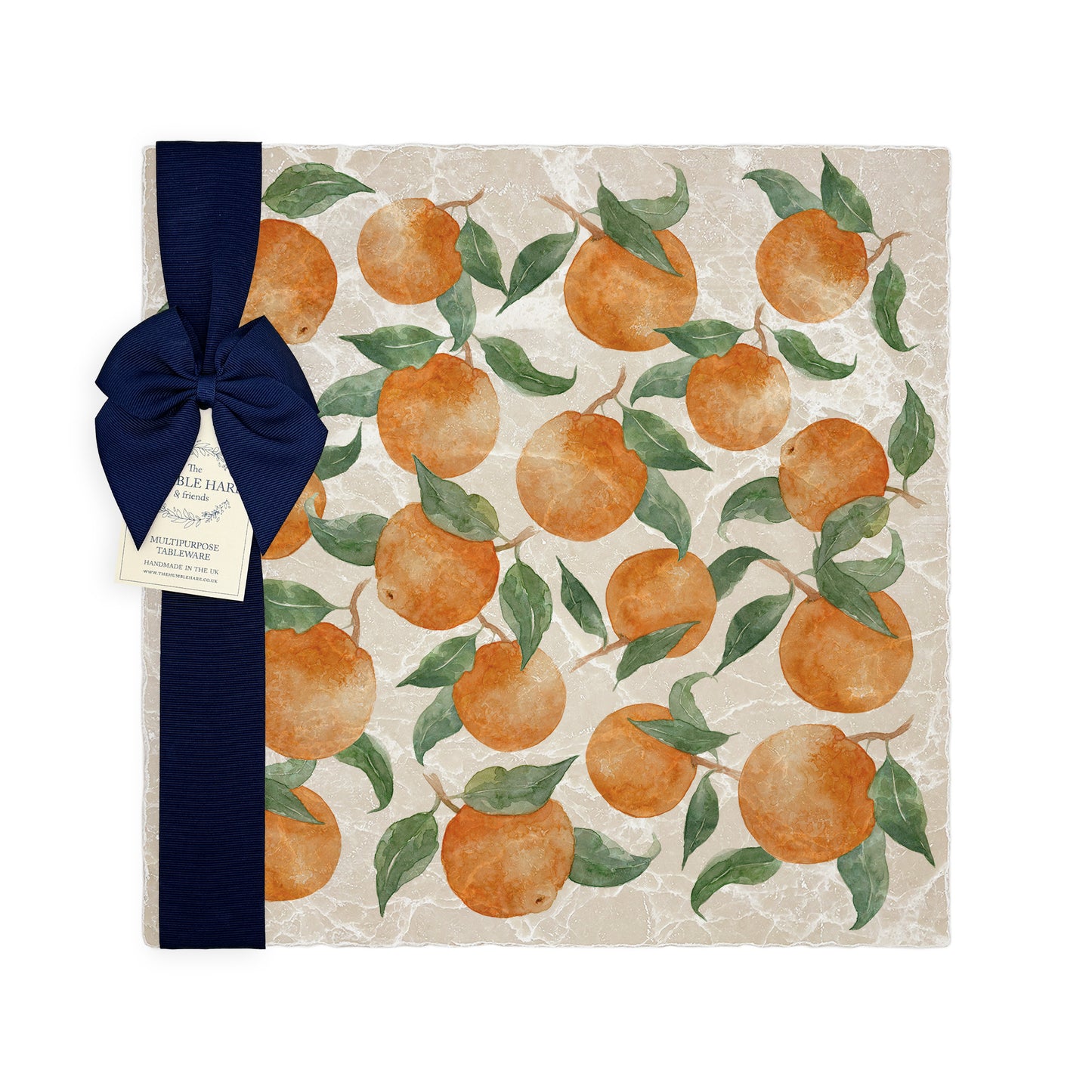 A large multipurpose marble platter with a watercolour pattern of tumble Mediterranean oranges and leaves.